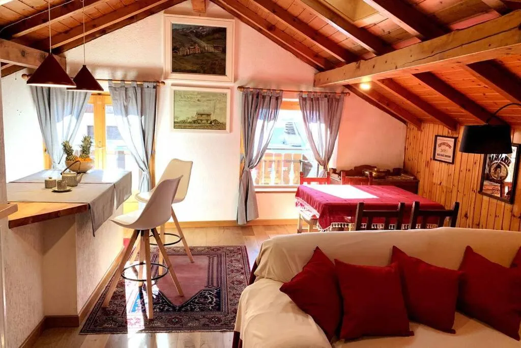 Living room, Bed in Mansarda D&D Bormio