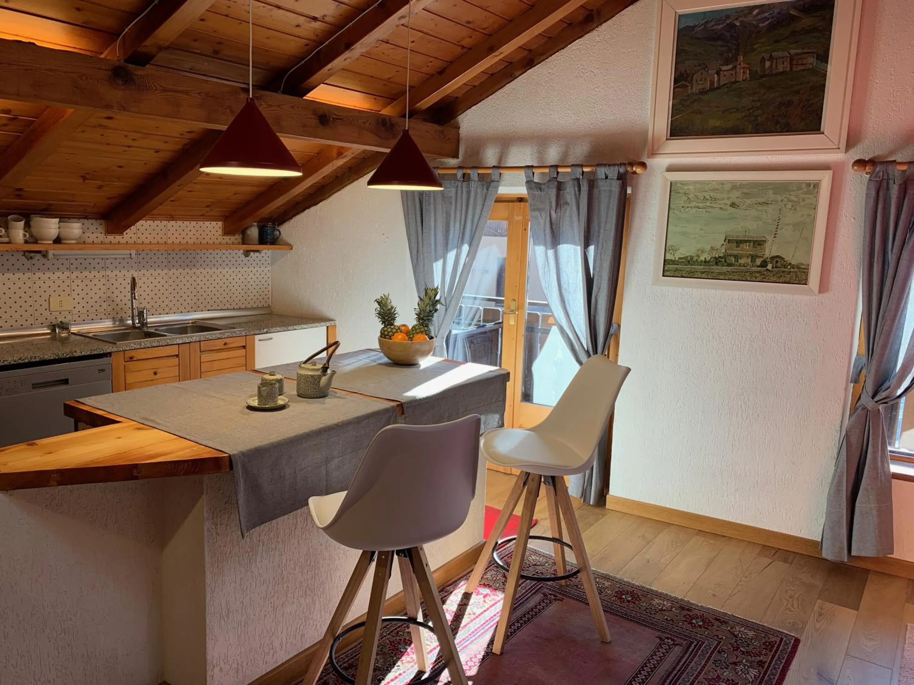 Kitchen or kitchenette in Mansarda D&D Bormio