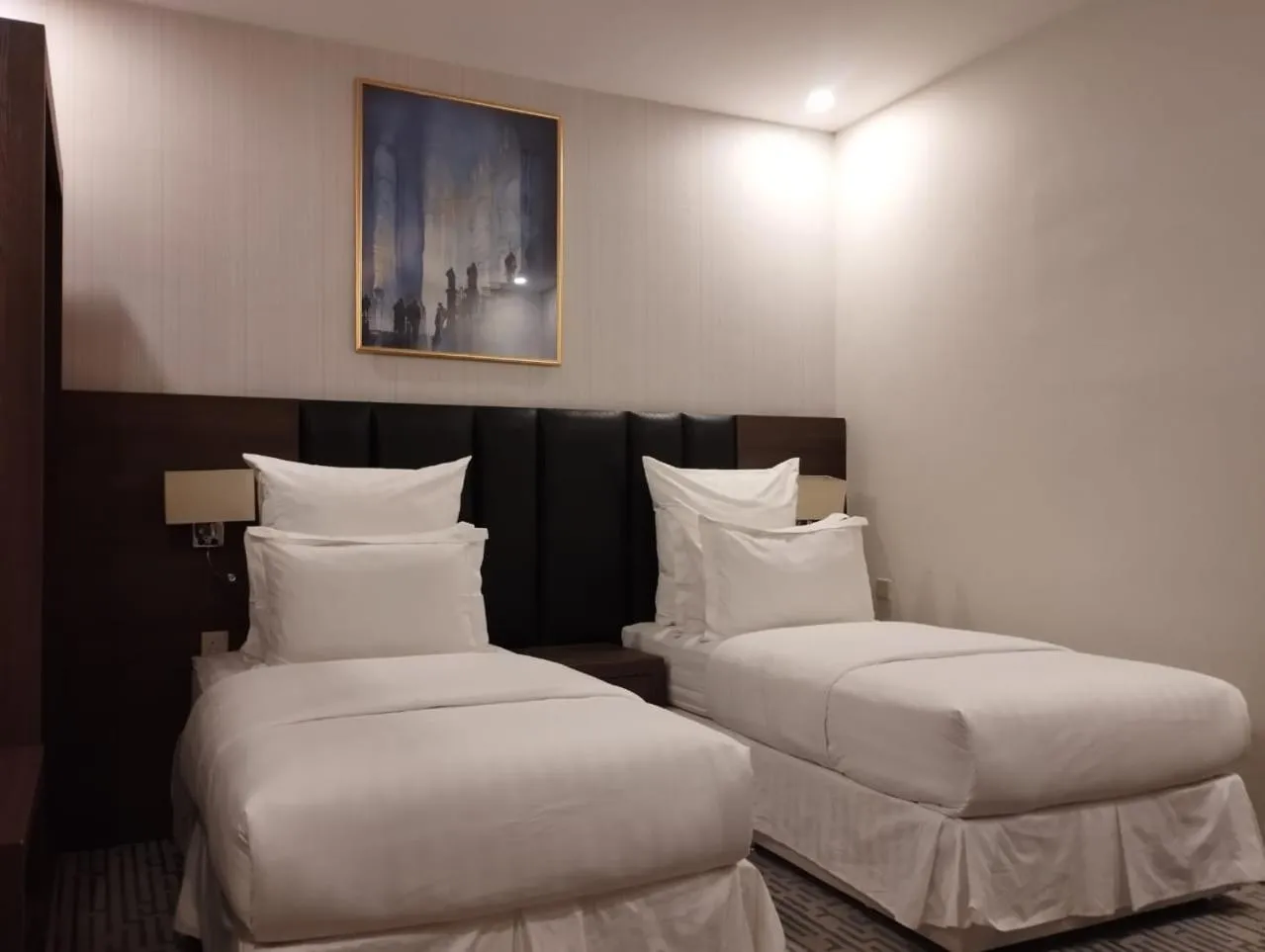 Bed in Olive Tree Hotel