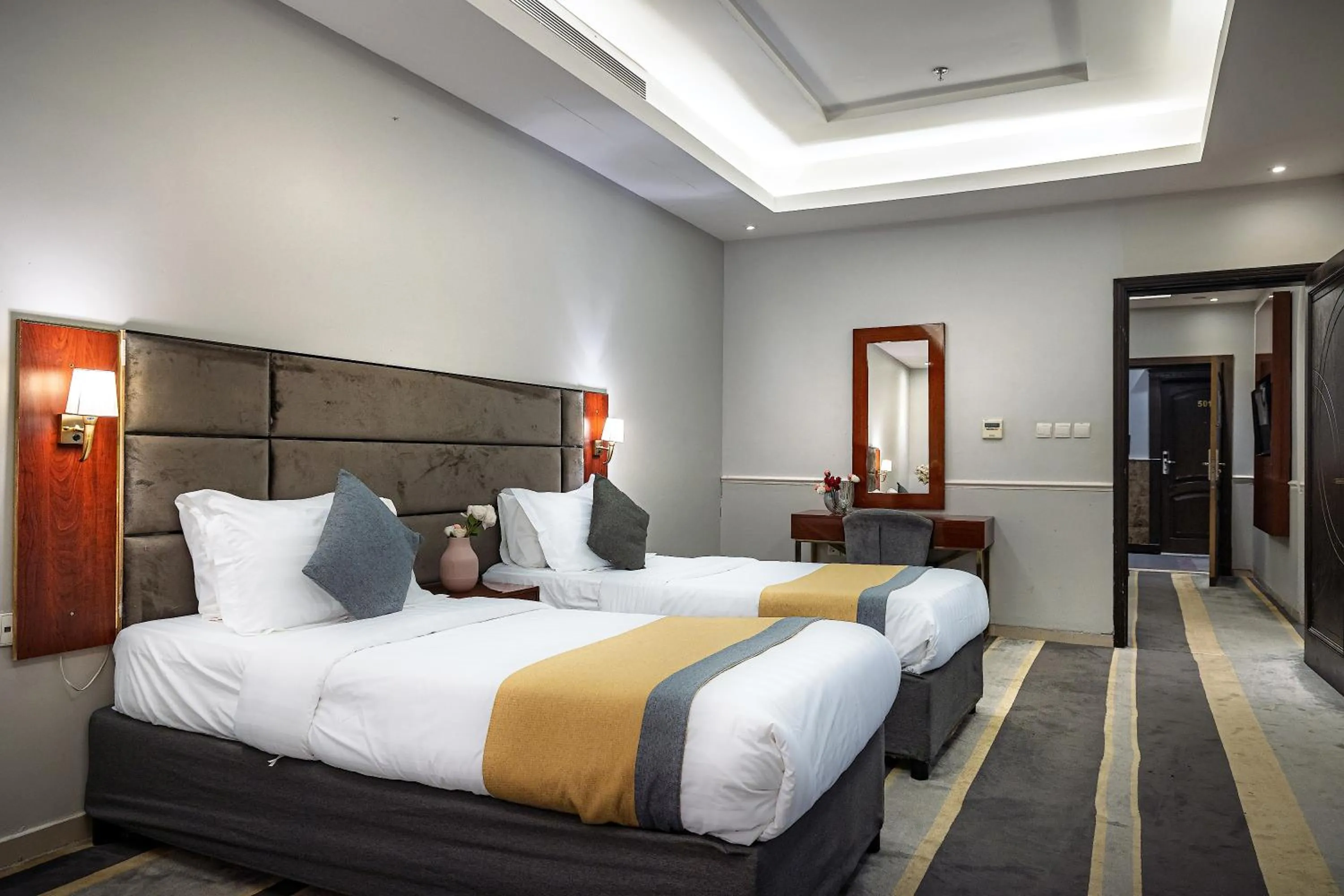 Bed in Rasis Serviced Apartments