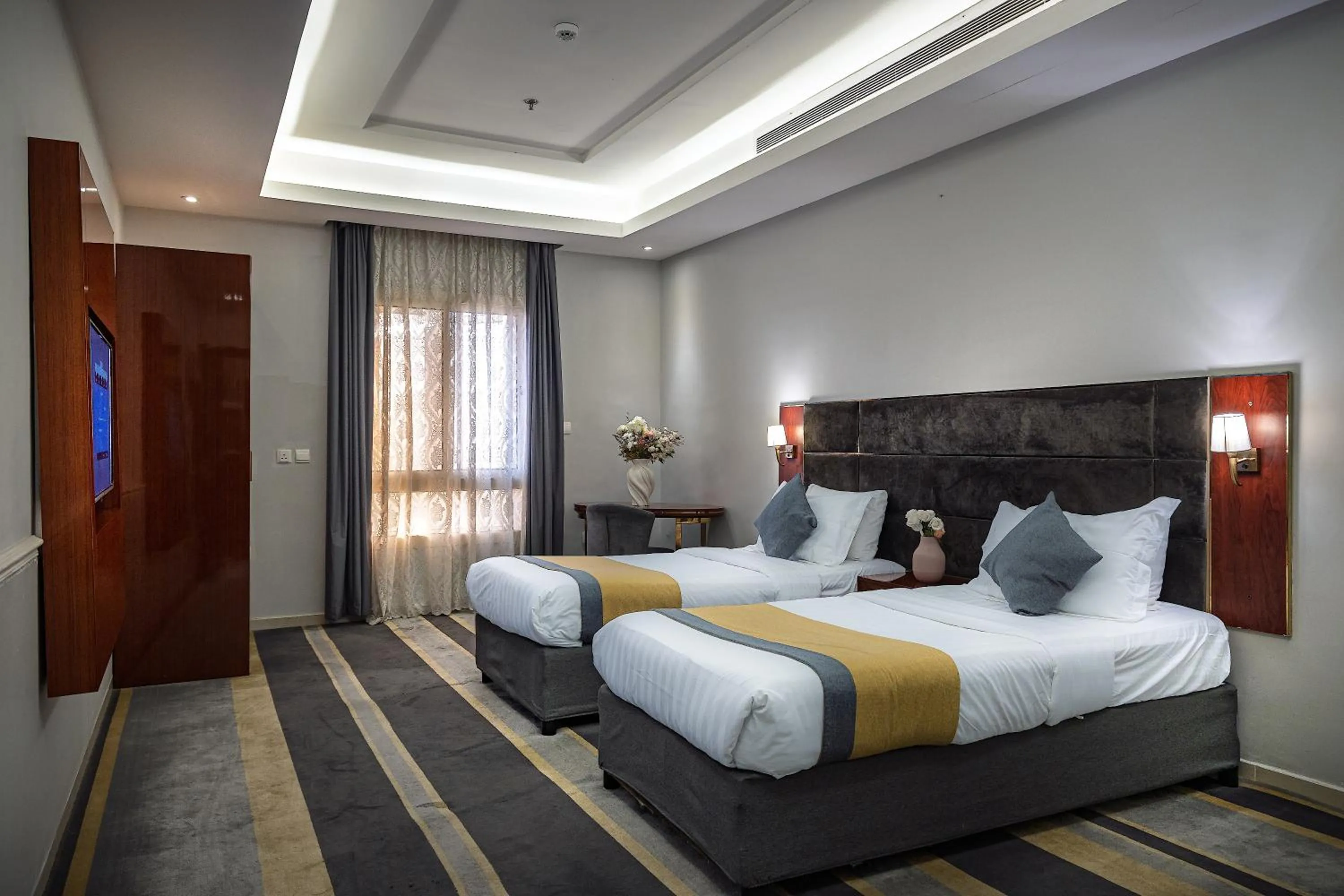 Bed in Rasis Serviced Apartments
