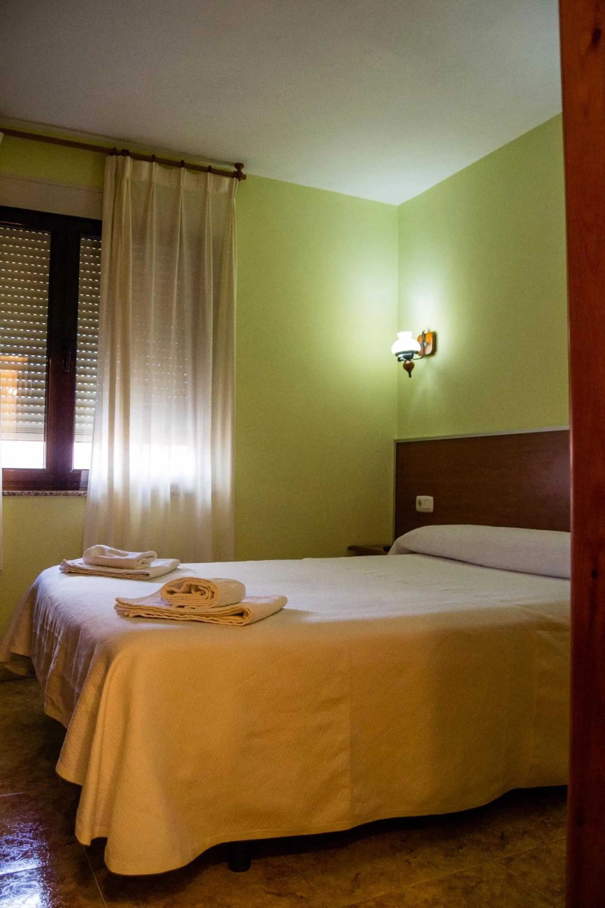 Bed in El Roble Hotel Restaurante