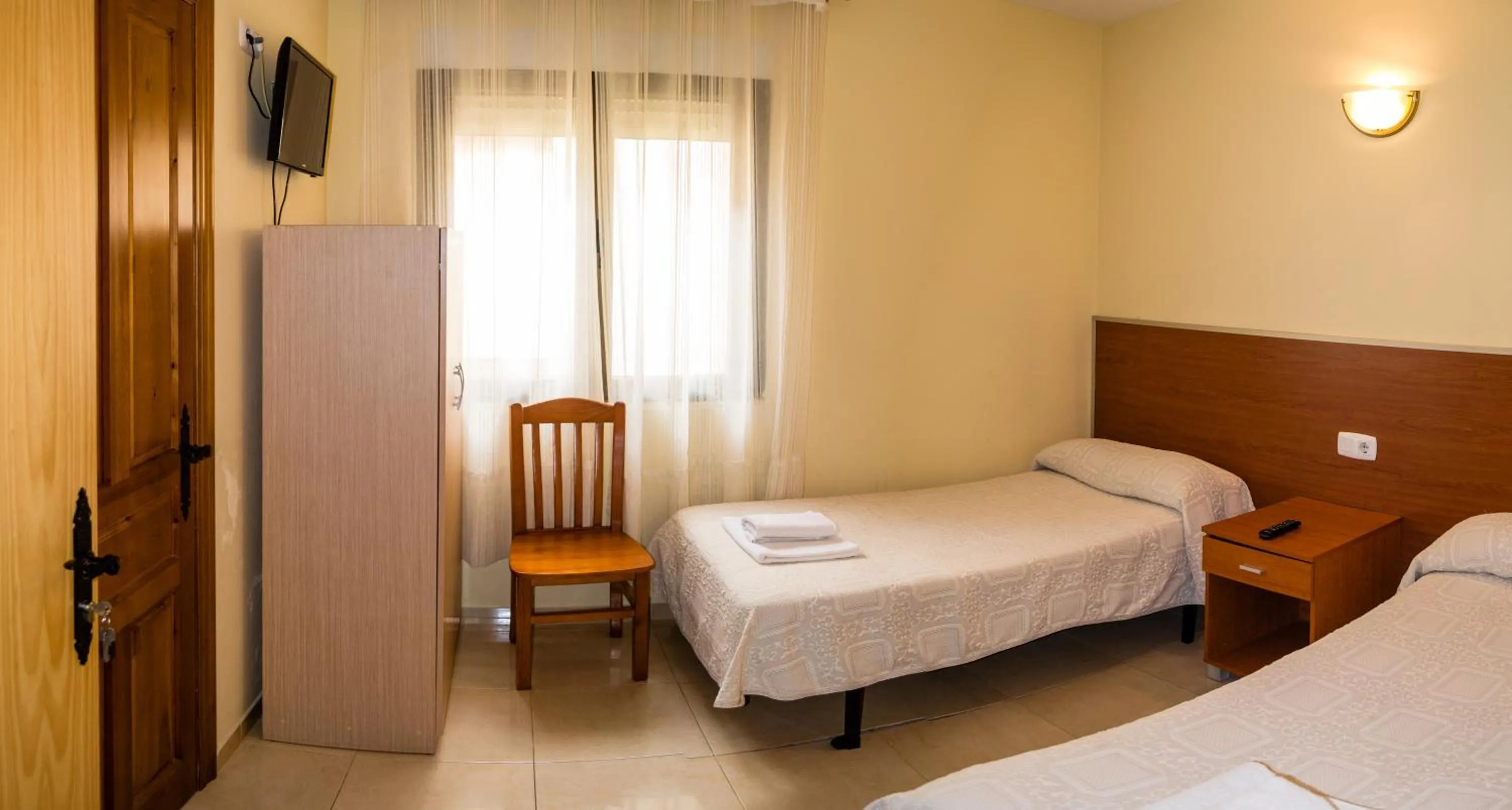 Bed in El Roble Hotel Restaurante