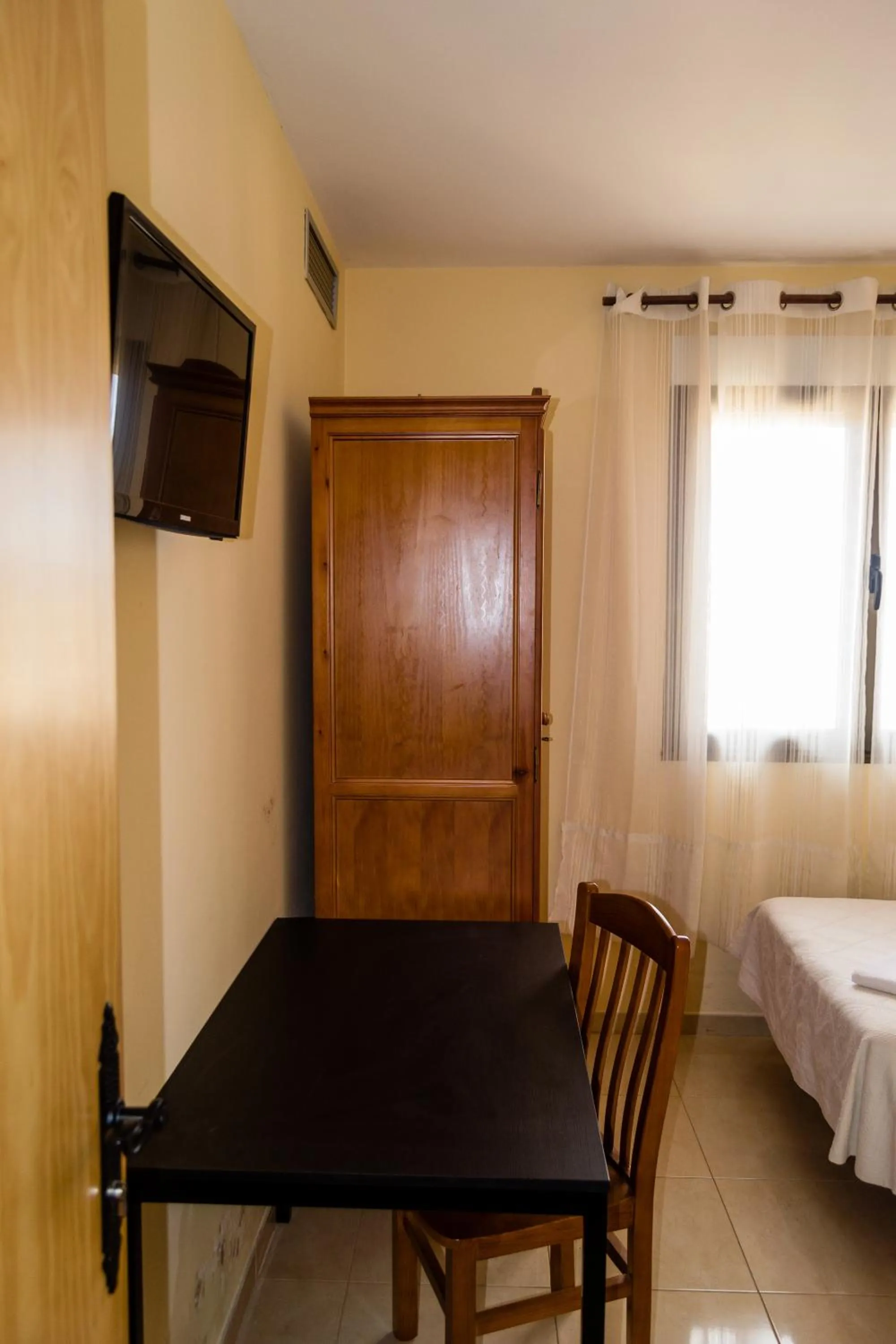 Bed in El Roble Hotel Restaurante