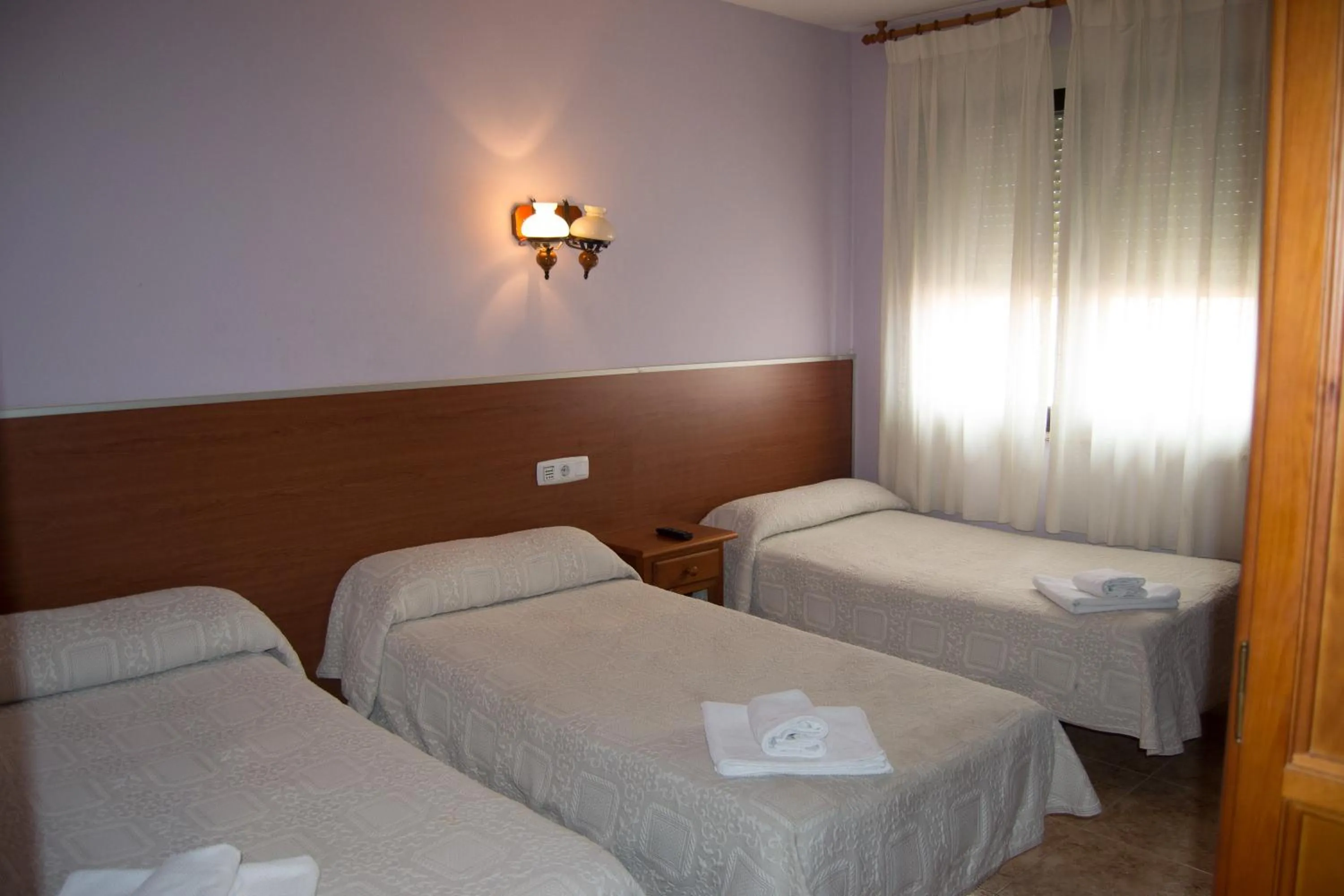 Bed in El Roble Hotel Restaurante