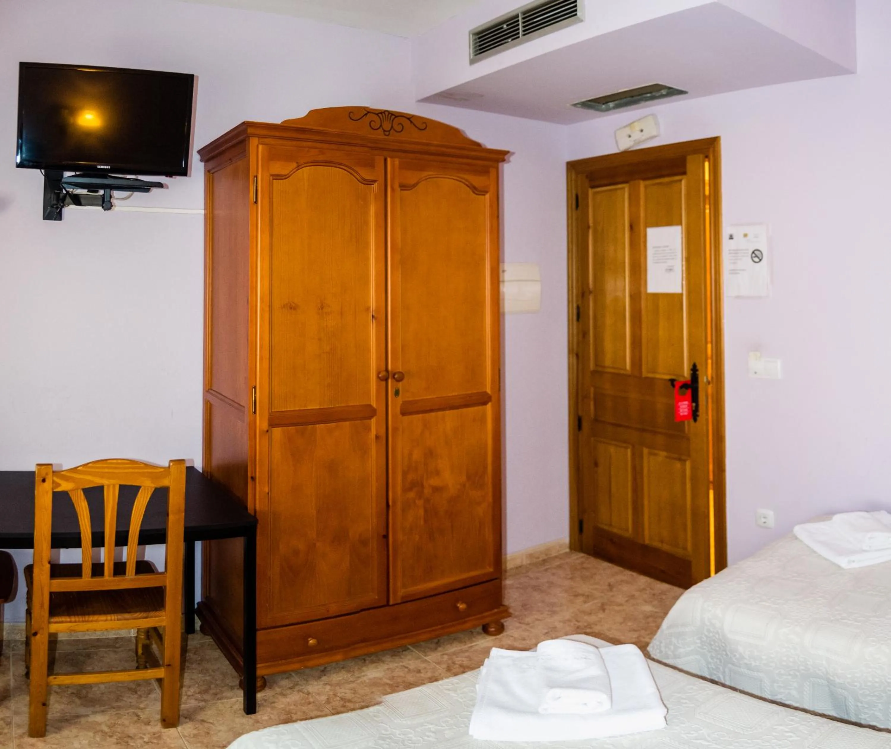 Bed in El Roble Hotel Restaurante