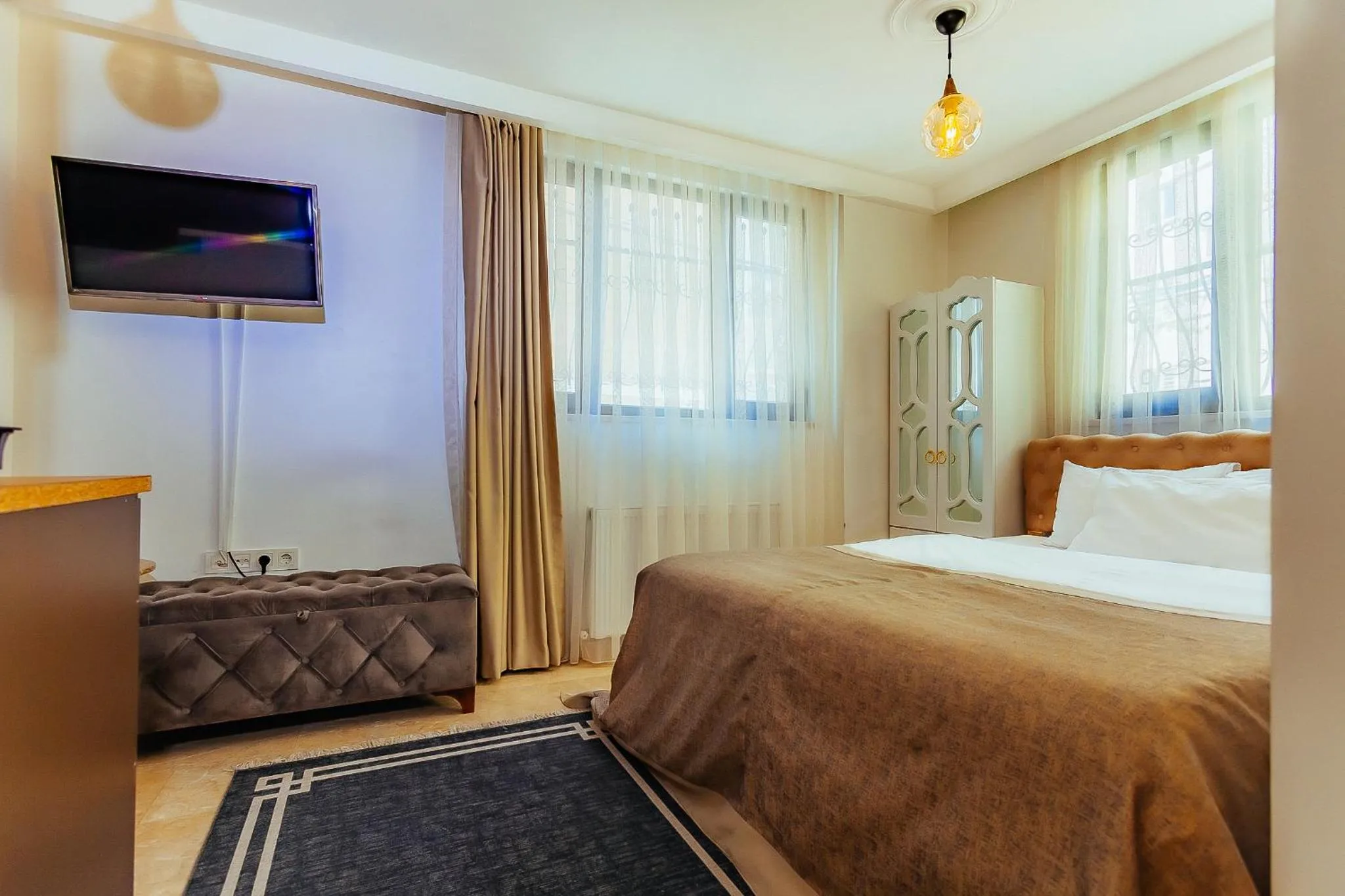 Bed in Taksim Wonder Suites