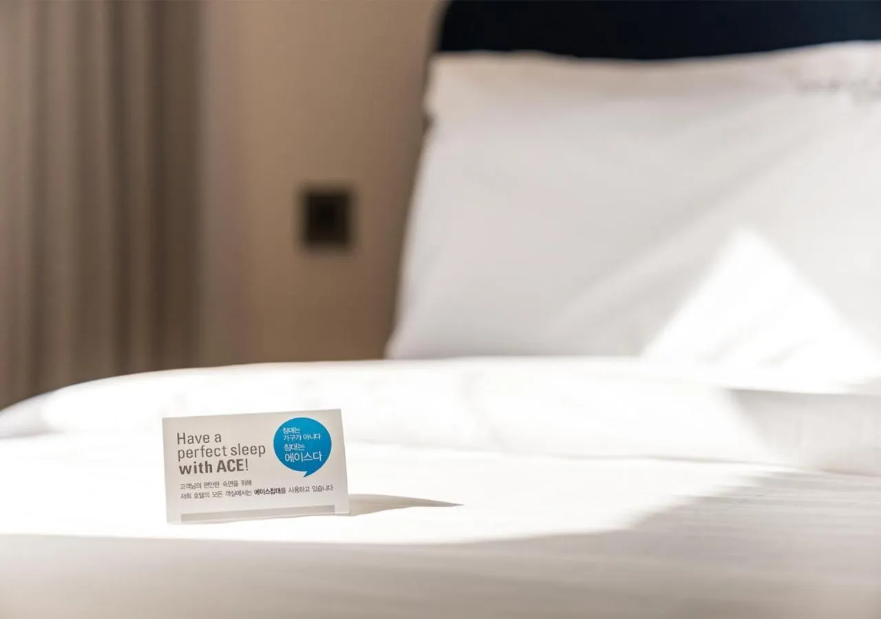 Bed in Nampo Ocean2Heaven Hotel& Spa