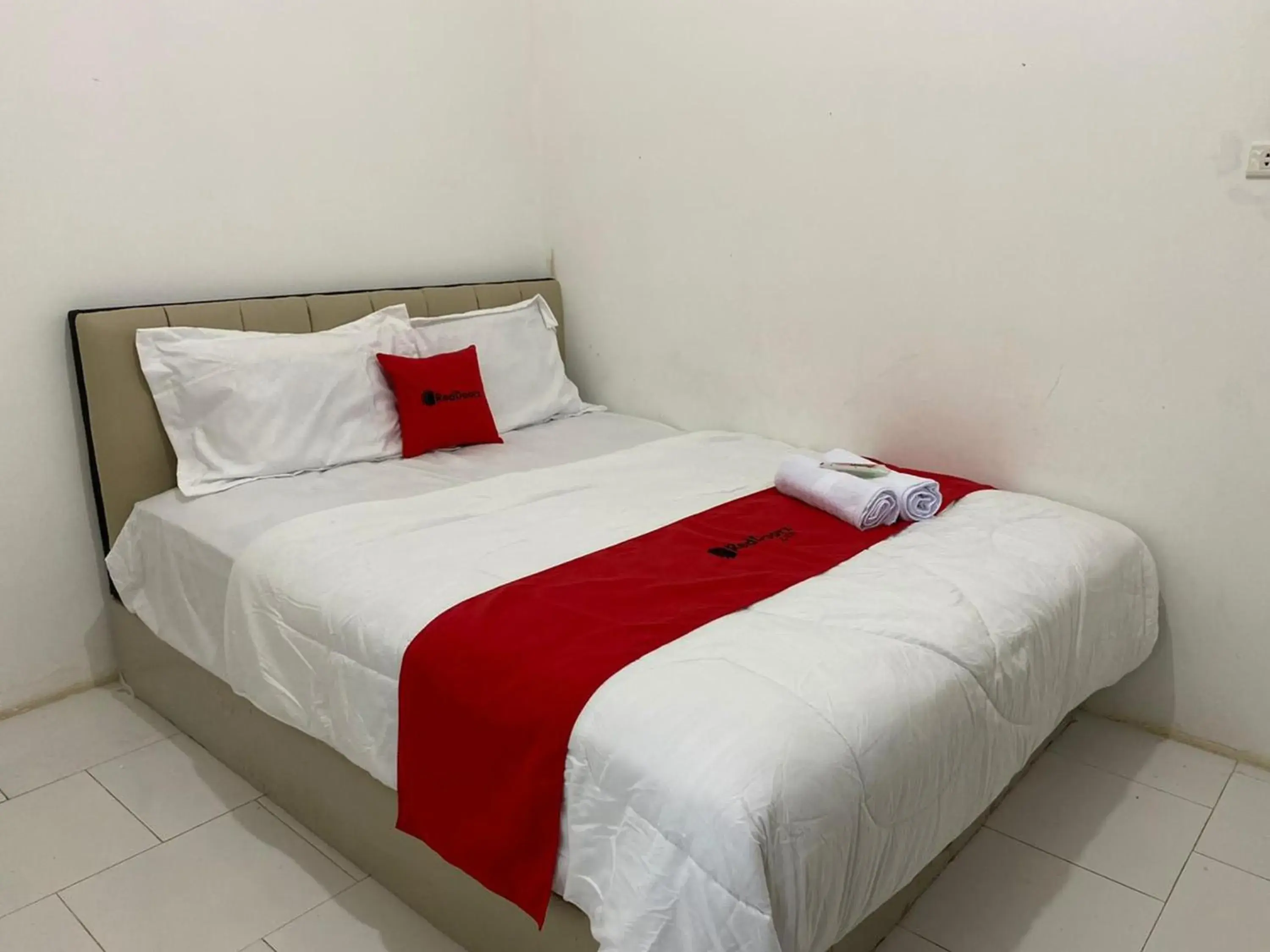 Bed in RedDoorz Plus at Puncak Mas Cottage Lampung Bed in RedDoorz Plus at Puncak Mas Cottage Lampung