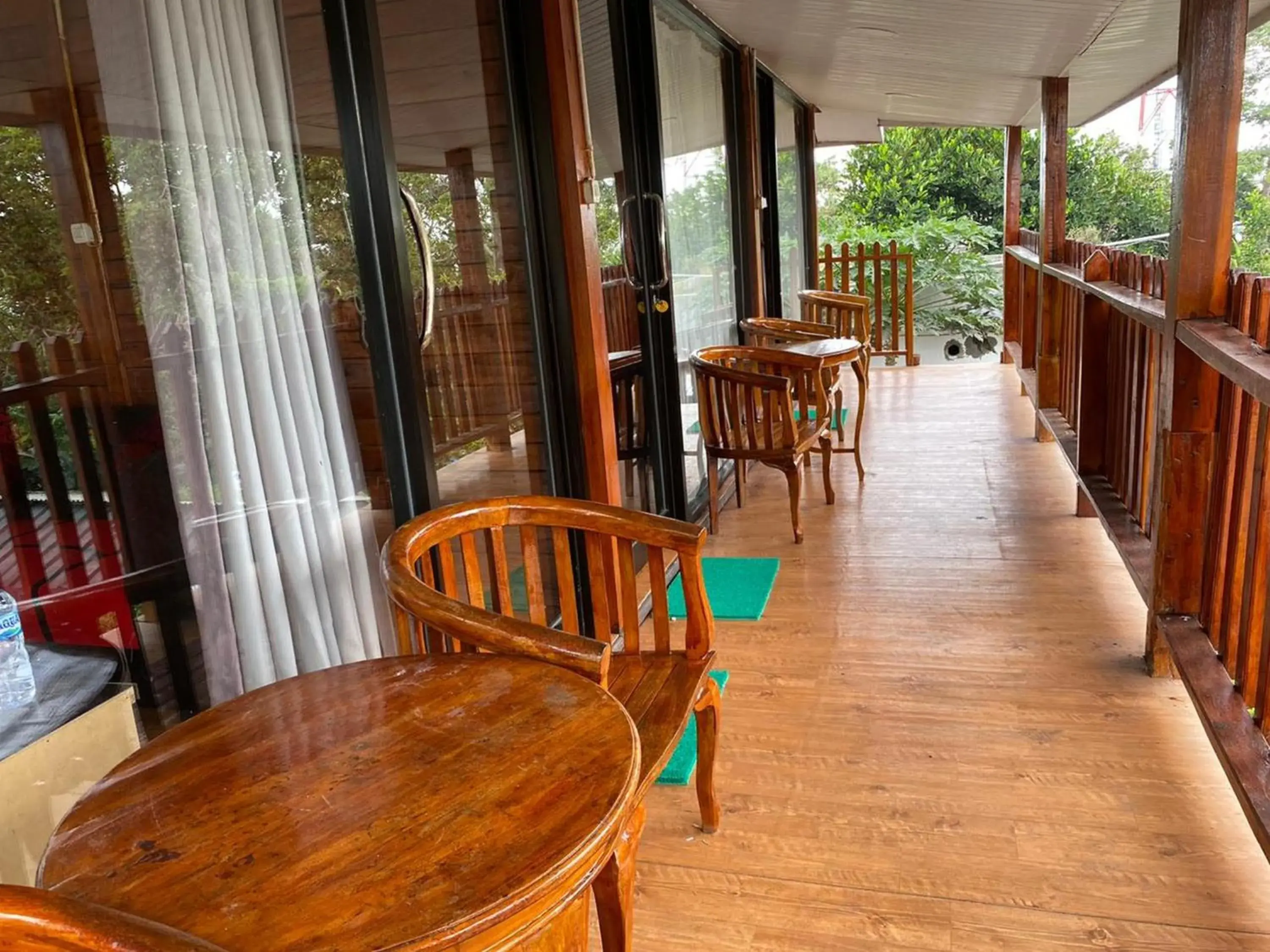 Balcony/Terrace in RedDoorz Plus at Puncak Mas Cottage Lampung Balcony/Terrace in RedDoorz Plus at Puncak Mas Cottage Lampung