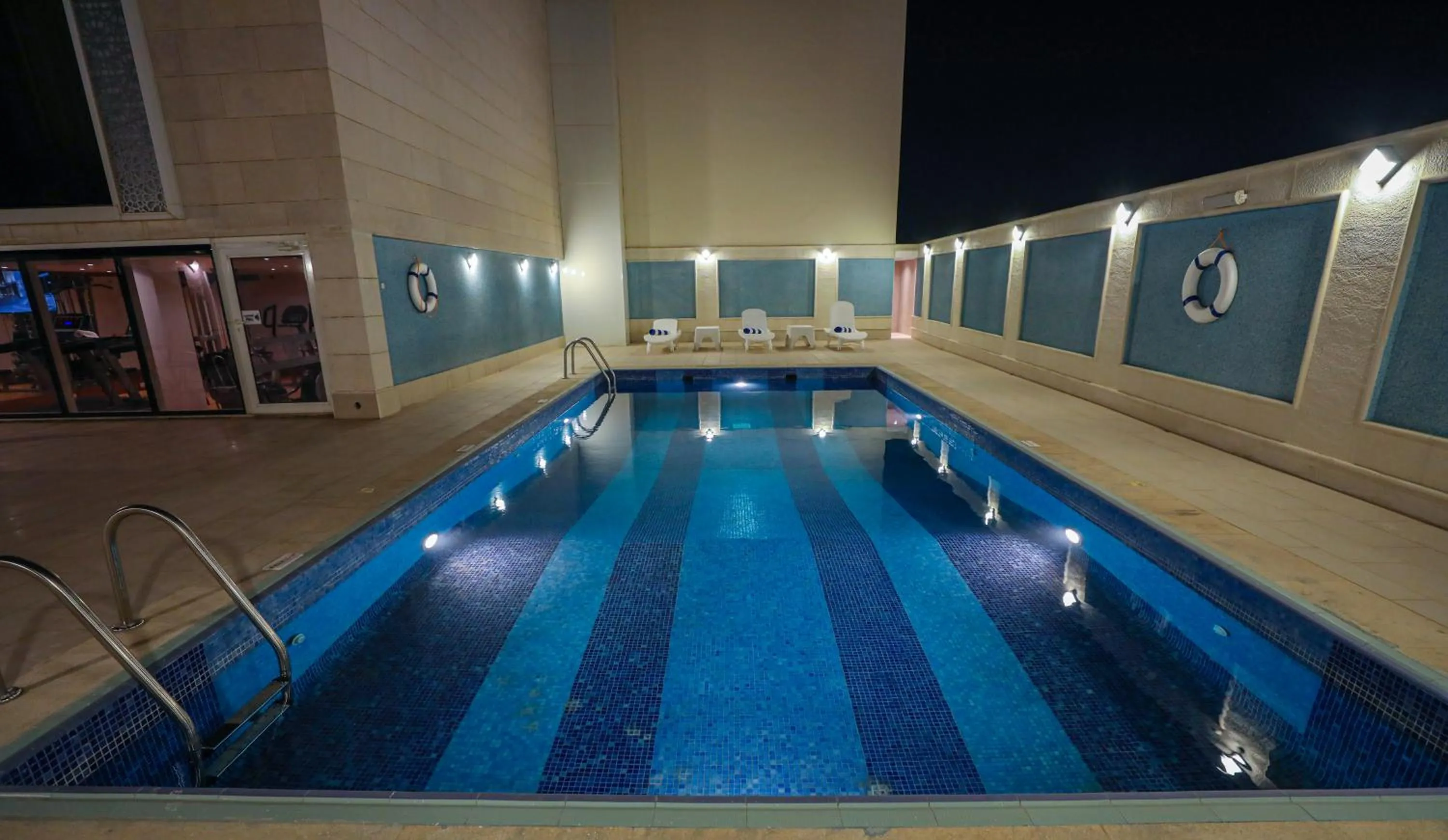 Swimming pool in Cheerful Al Waha Unayzah Hotel