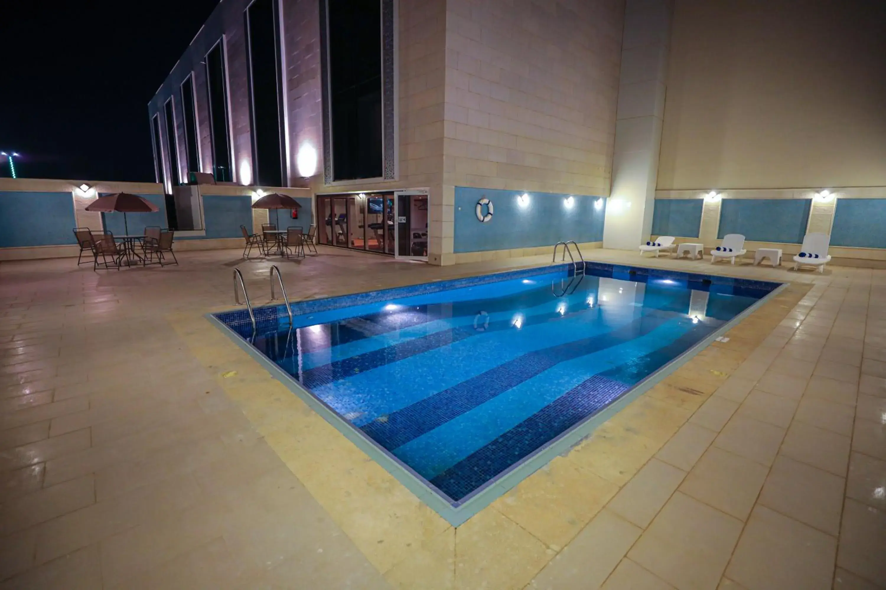 Swimming pool in Cheerful Al Waha Unayzah Hotel Swimming pool in Cheerful Al Waha Unayzah Hotel