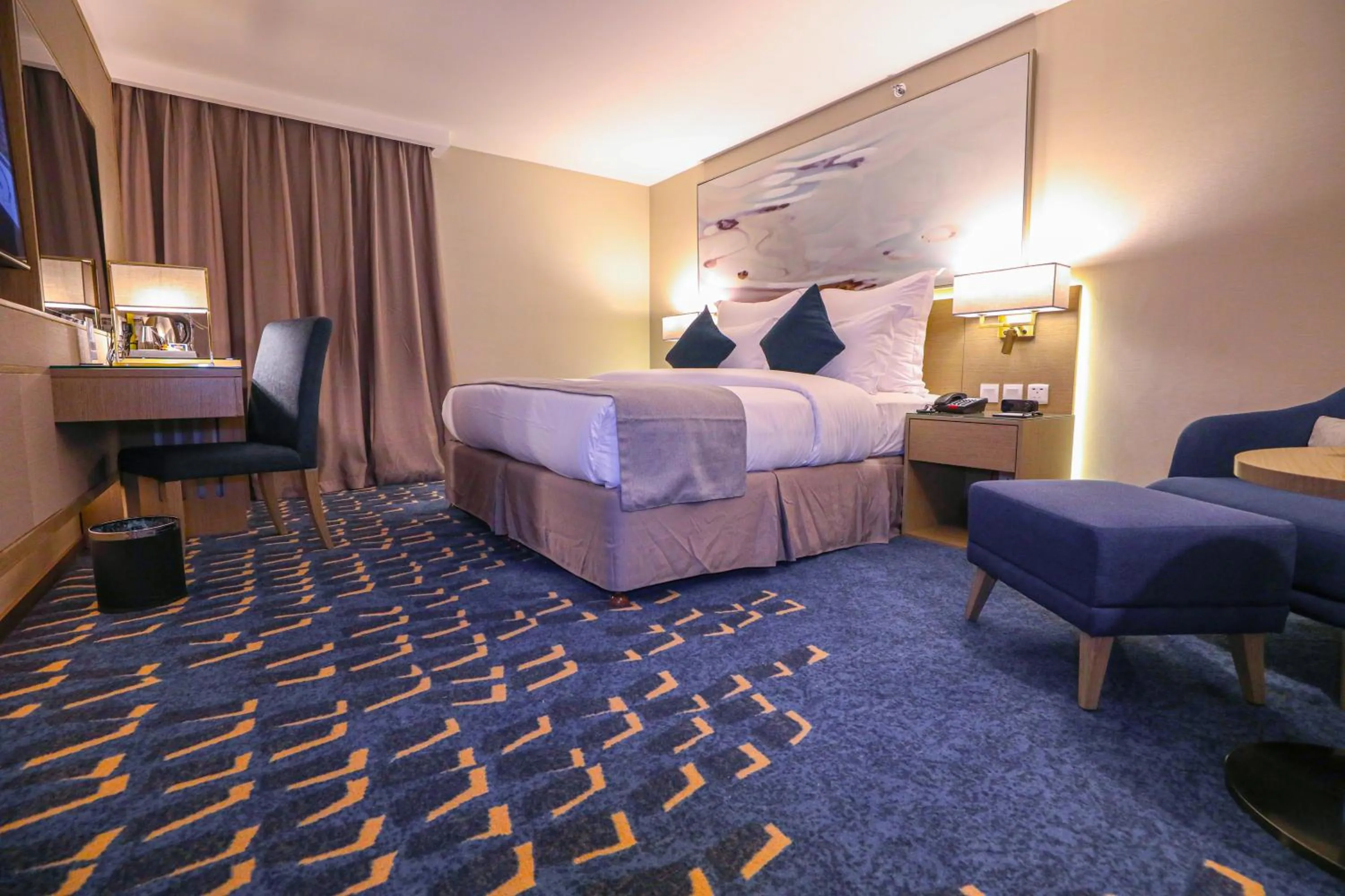 Bedroom in Cheerful Al Waha Unayzah Hotel