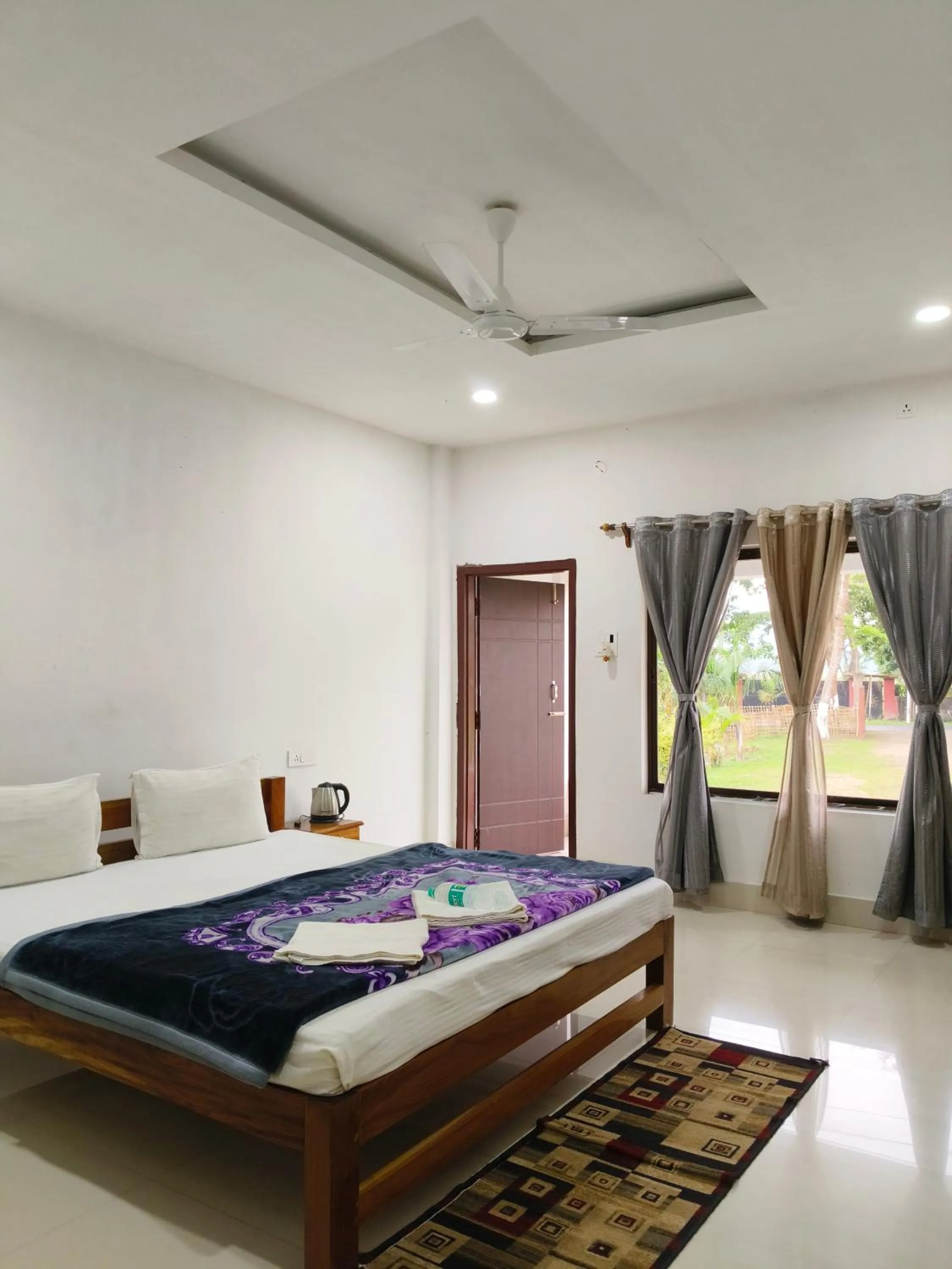 Bedroom, Bed in Shivaji Inn Kaziranga