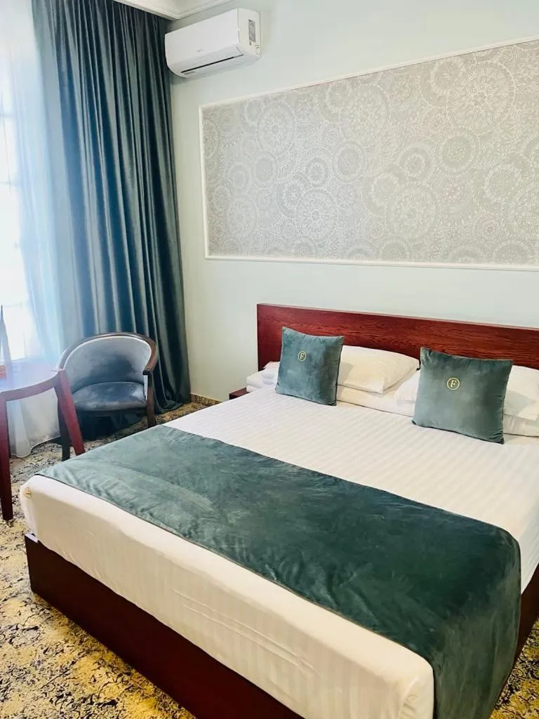 Bedroom, Bed in Grand Fortune Hotel