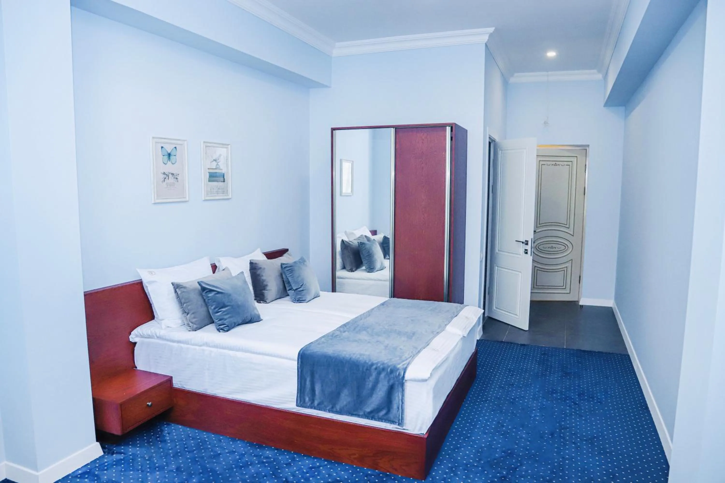 Bed in Grand Fortune Hotel