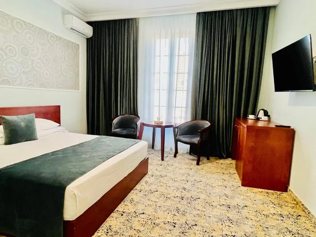 Bedroom, Bed in Grand Fortune Hotel