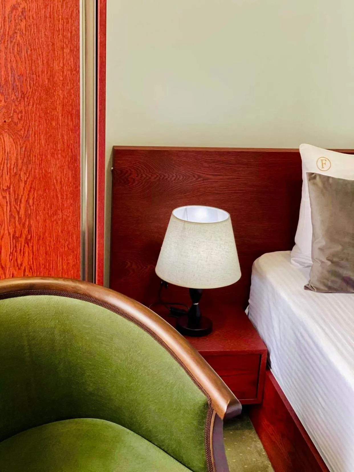 Seating area, Bed in Grand Fortune Hotel