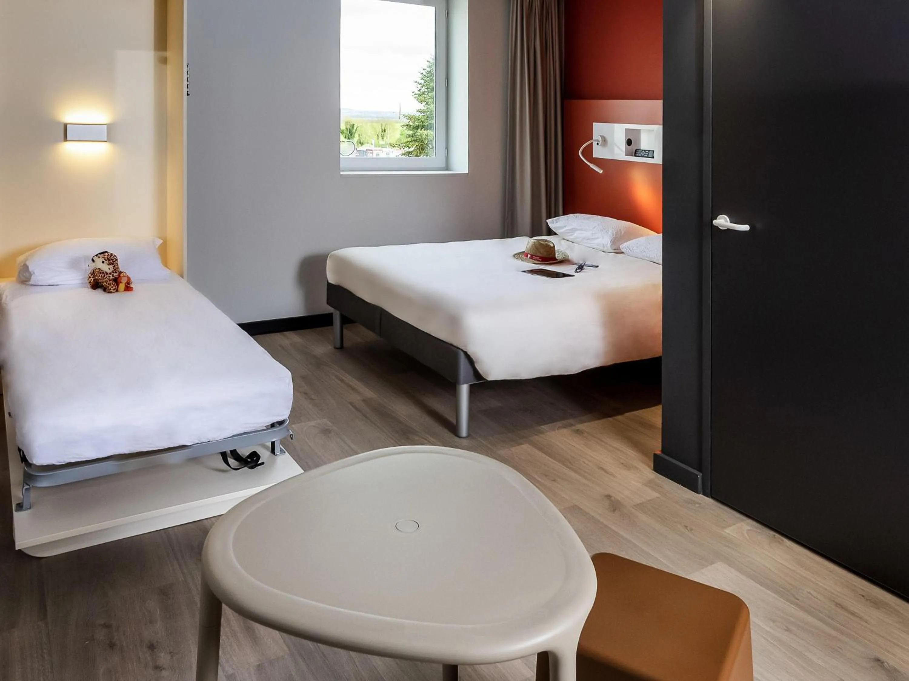 Bedroom, Bed in ibis Budget Cognac