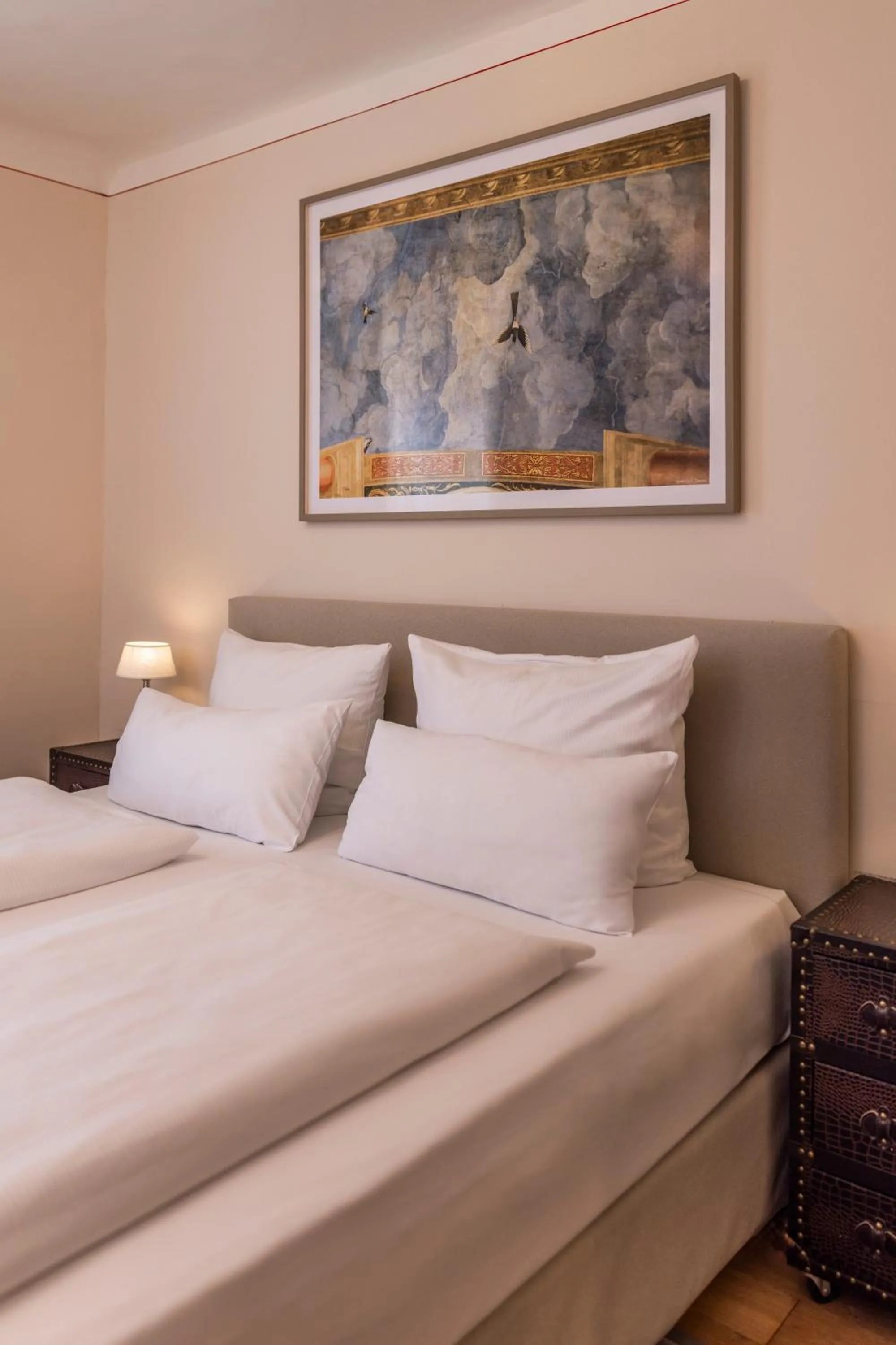 Bed in Boutiquehotel Amadeus