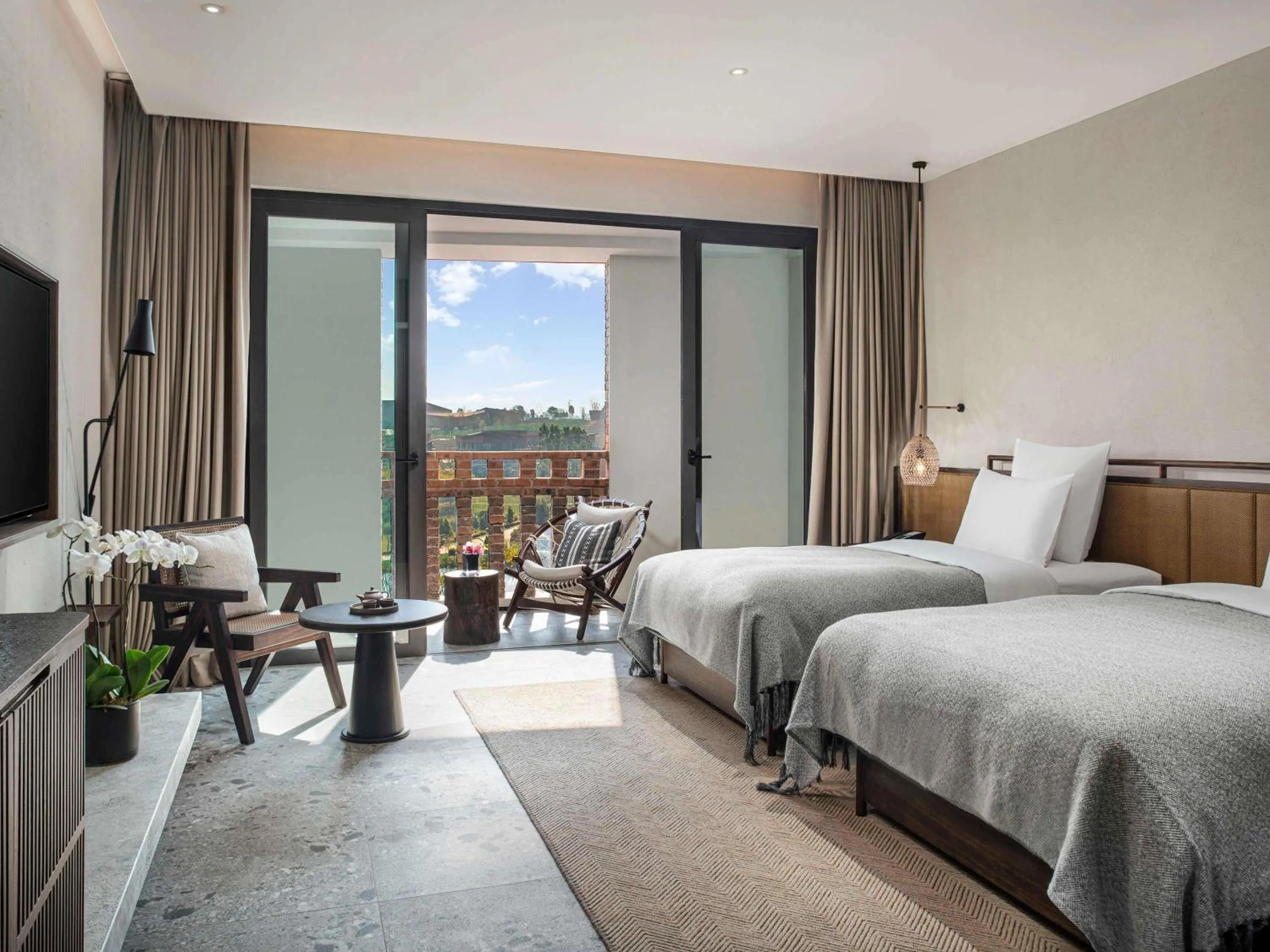 Bedroom, Bed in DongFengYun Hotel Mi'Le - MGallery Collection