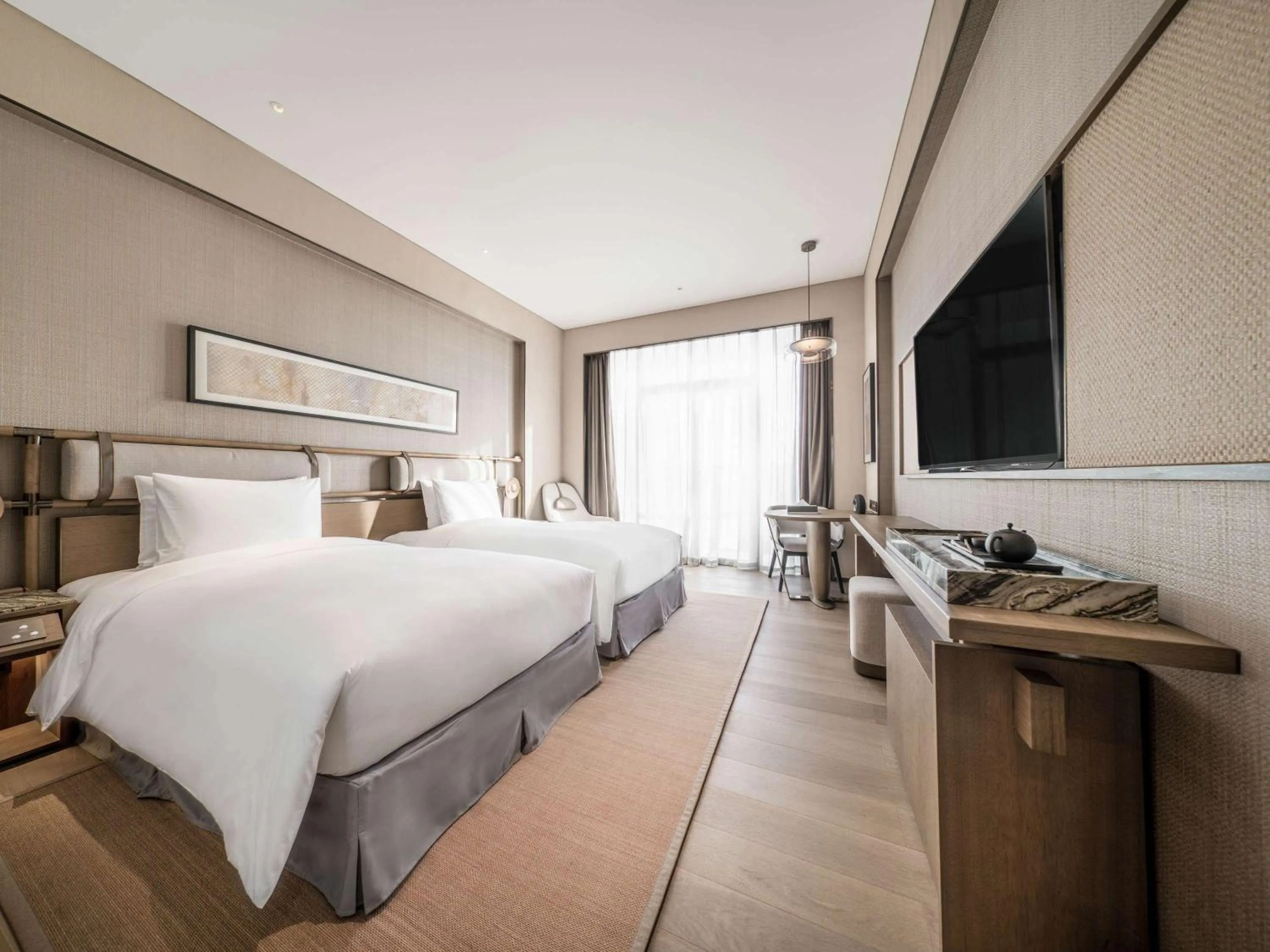 Photo of the whole room, Bed in Ocean Spring Resort Chengdu - MGallery Collection