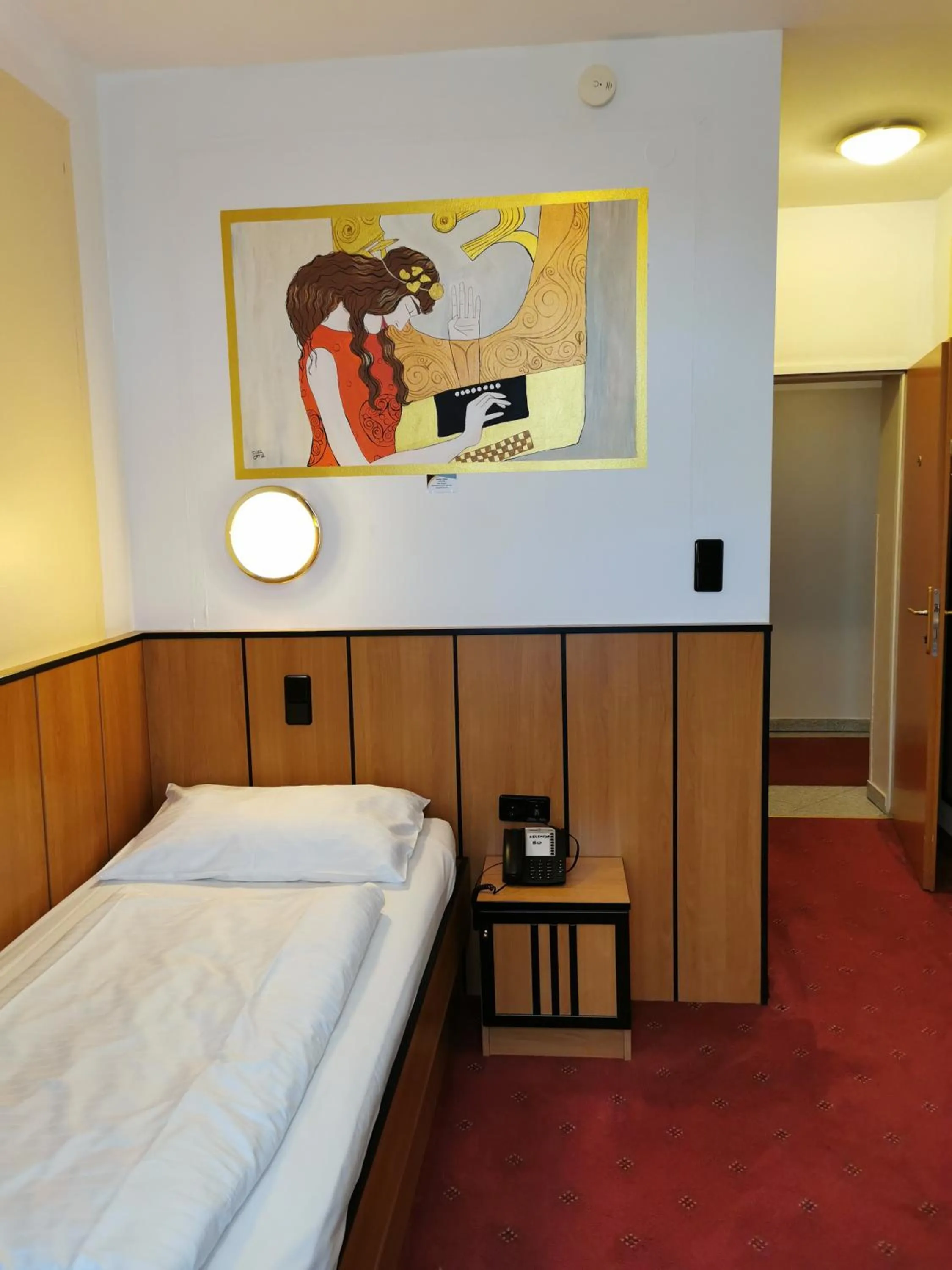 Bed in Garten- und Kunsthotel Gabriel City