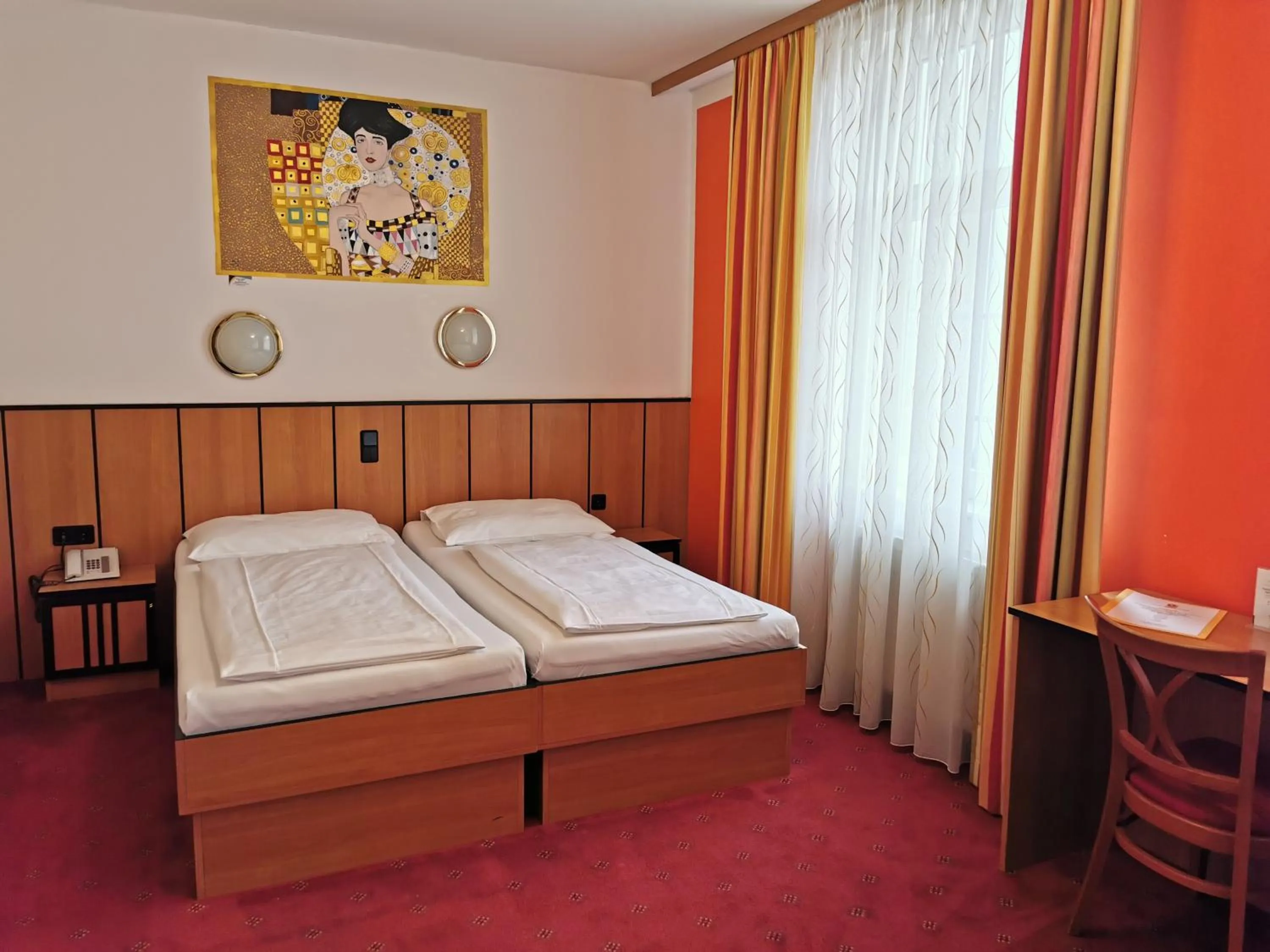 Bed in Garten- und Kunsthotel Gabriel City