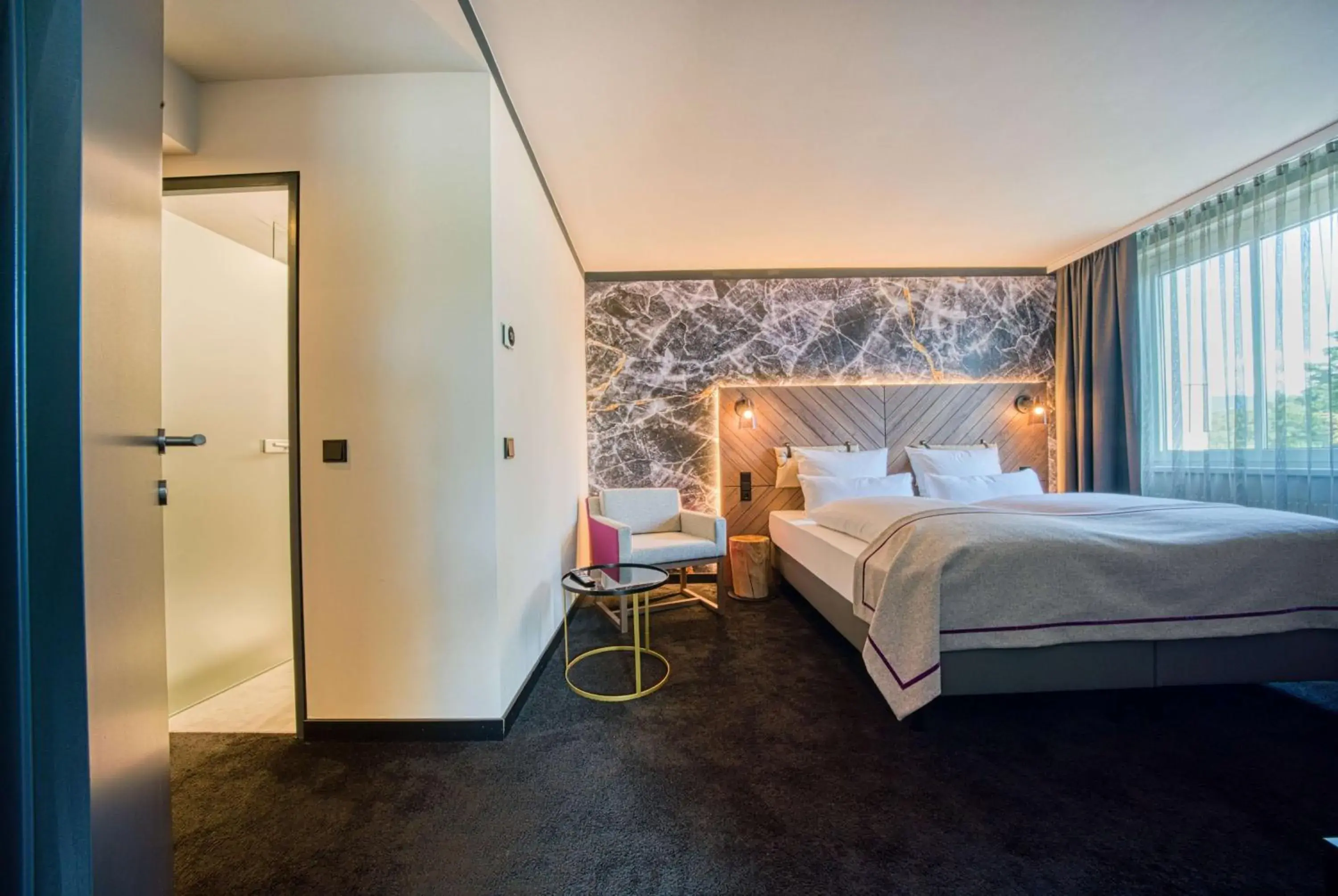 Photo of the whole room, Bed in FourSide Hotel Salzburg Messe, Trademark Collection by Wyndham Photo of the whole room, Bed in FourSide Hotel Salzburg Messe, Trademark Collection by Wyndham