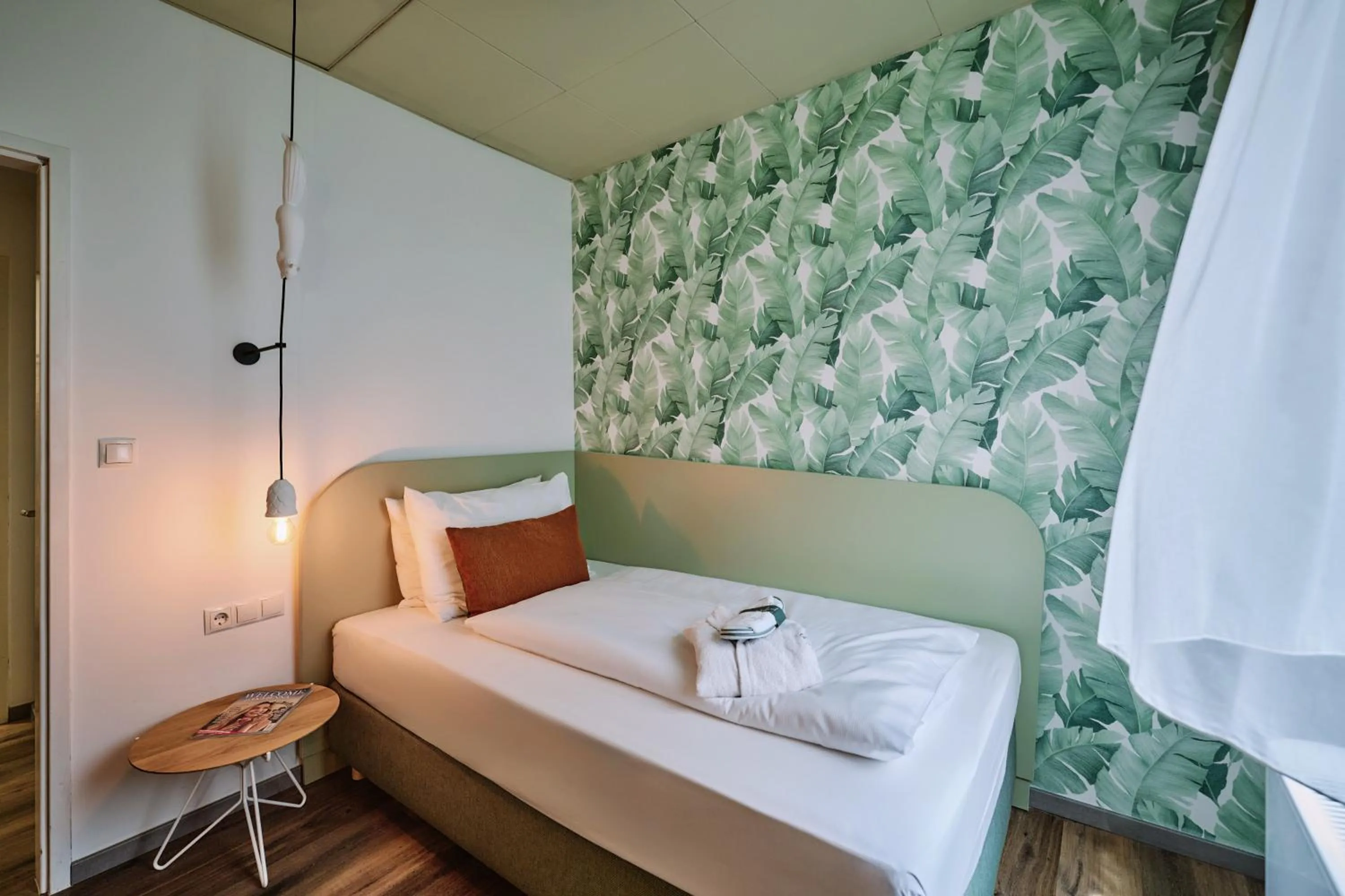 Bed in The Weekend Hotel