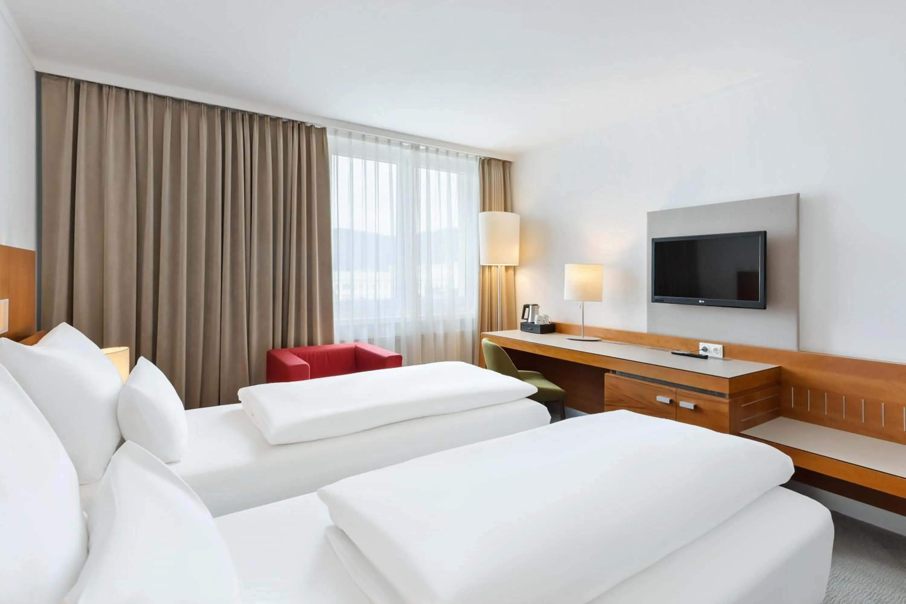 Photo of the whole room, Bed in Austria Trend Hotel Europa Graz Hauptbahnhof