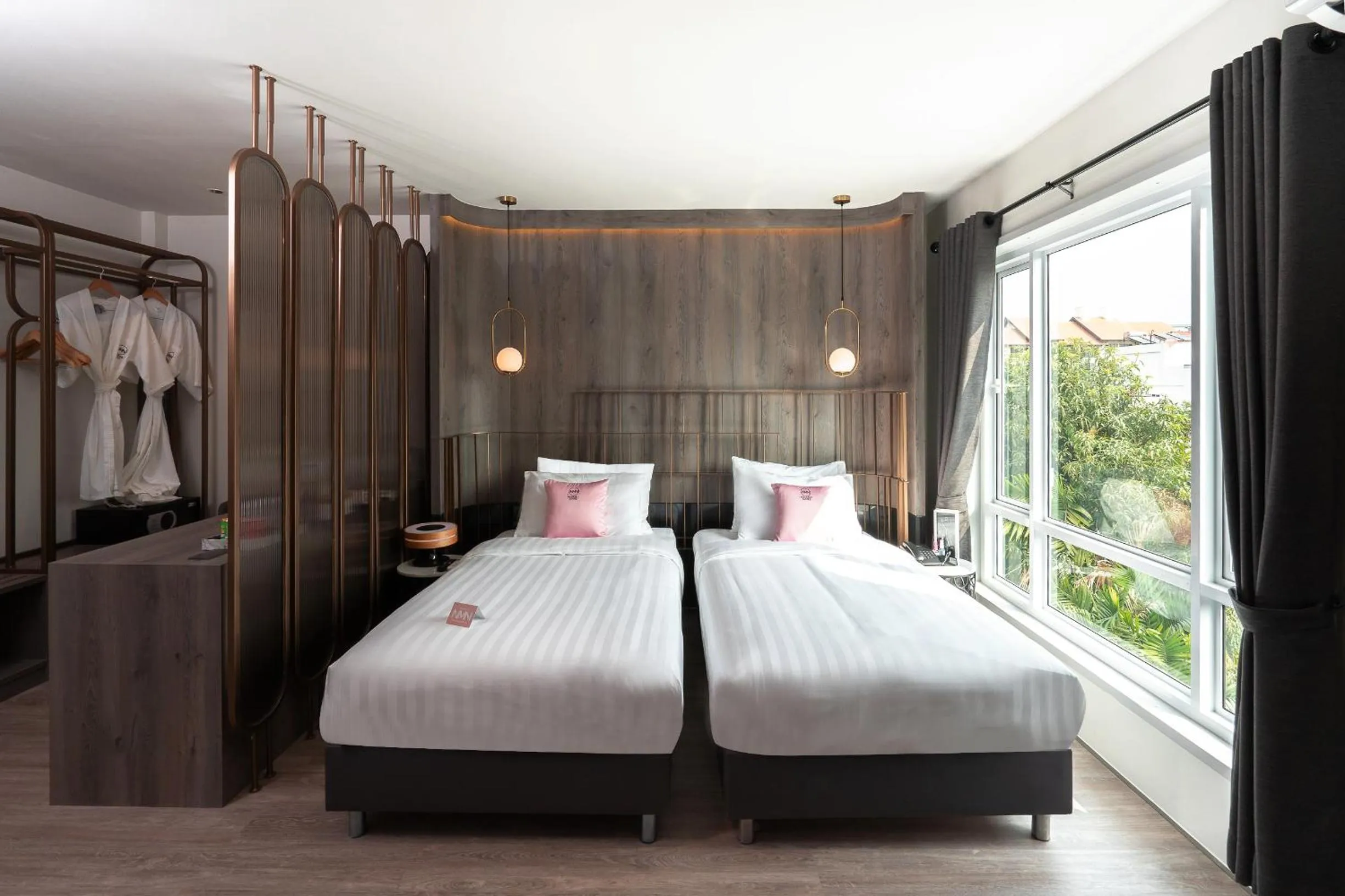 Bed in NIMANO SUITES