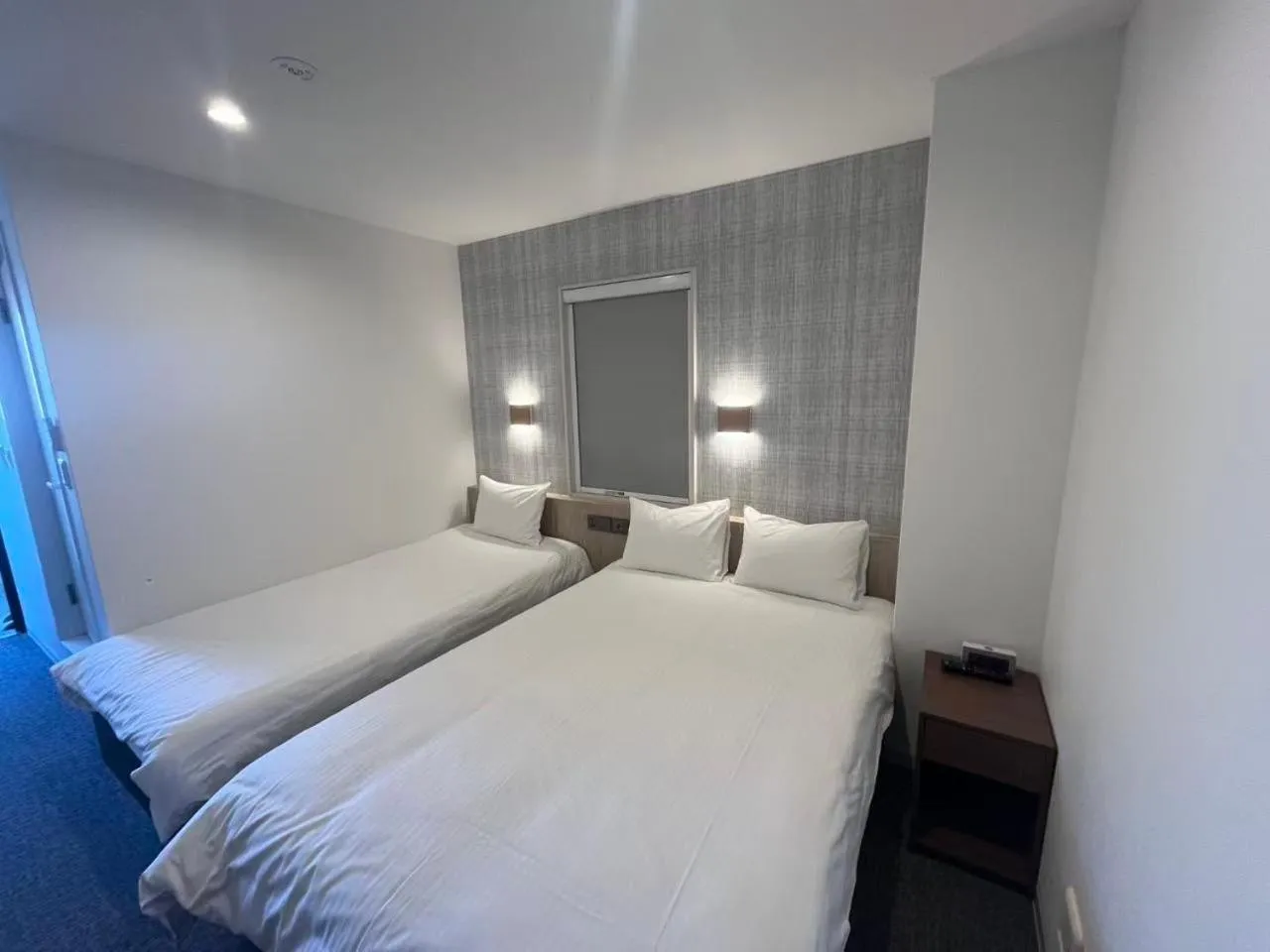 Bed in Plaza In Kanku Hotel