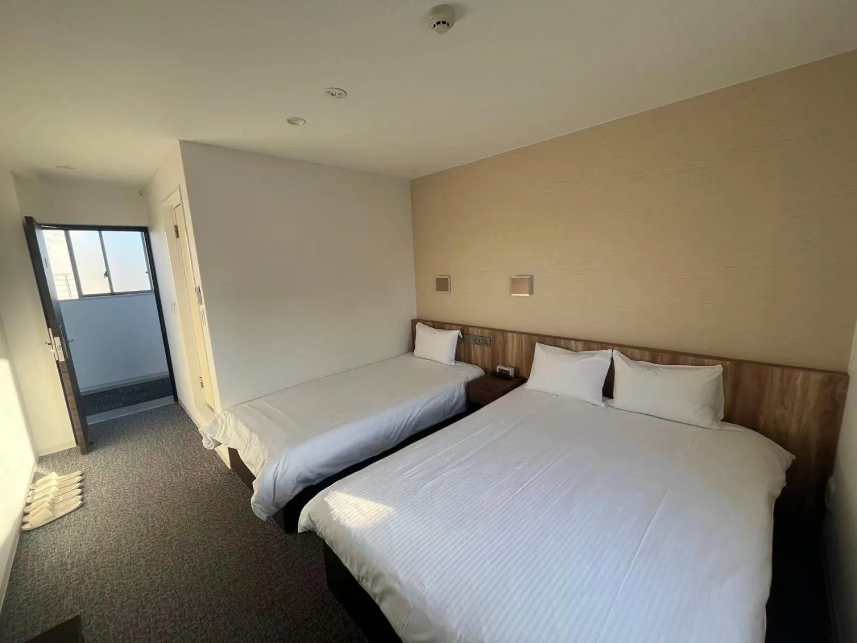 Bed in Plaza In Kanku Hotel