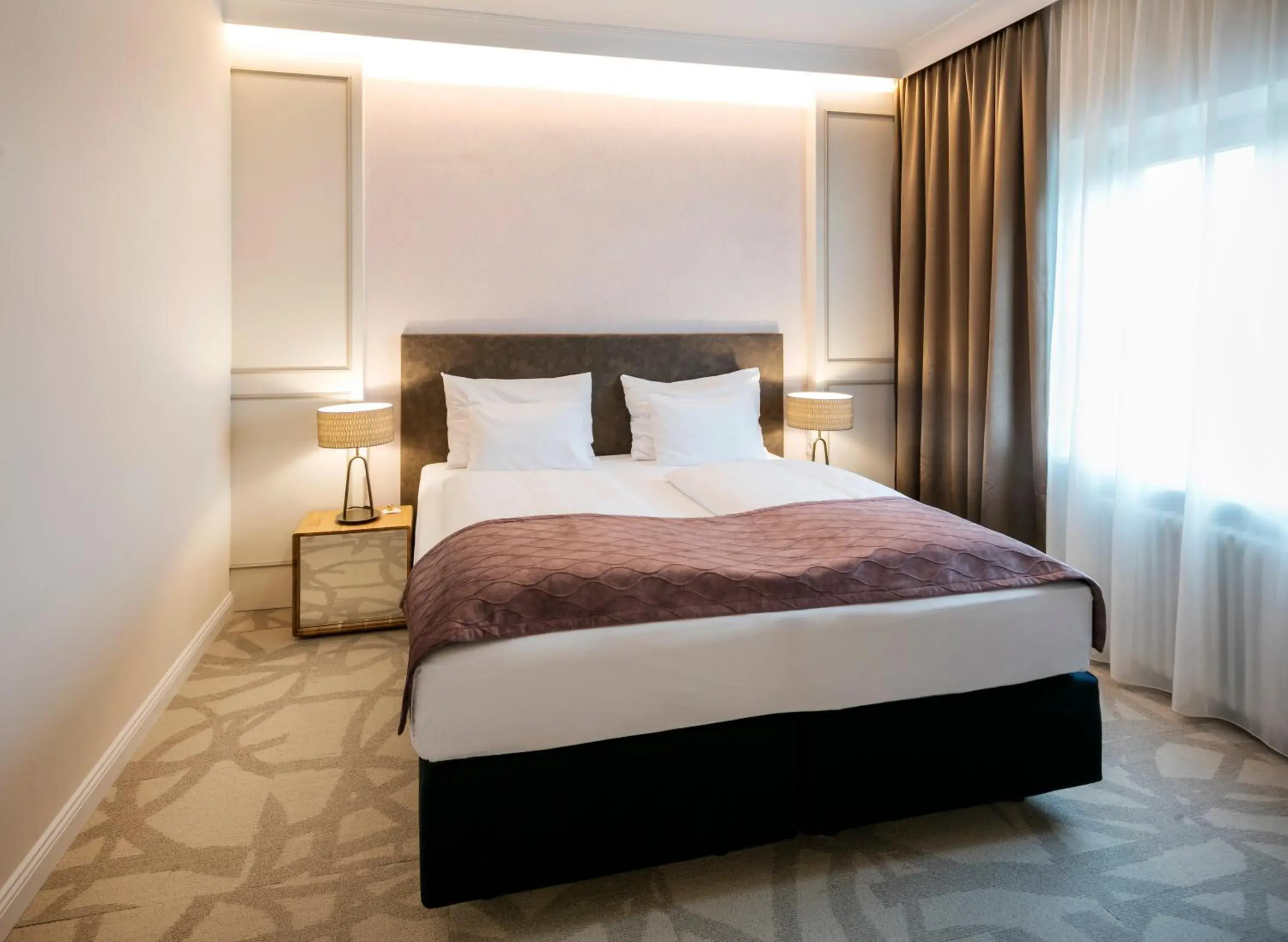 Bed in ARCOTEL Castellani Salzburg Bed in ARCOTEL Castellani Salzburg