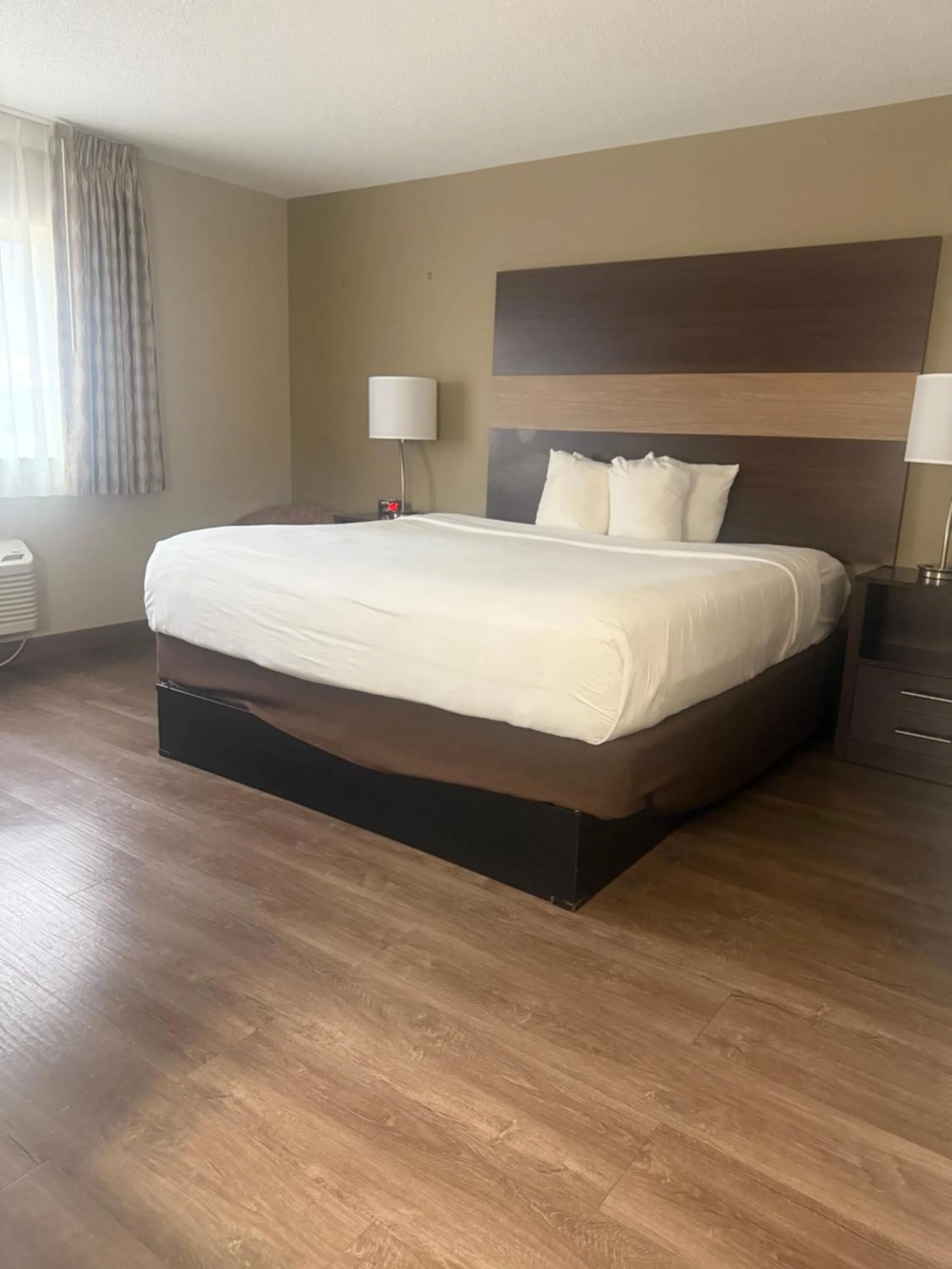 Bed in MainStay Suites Columbus near Fort Benning