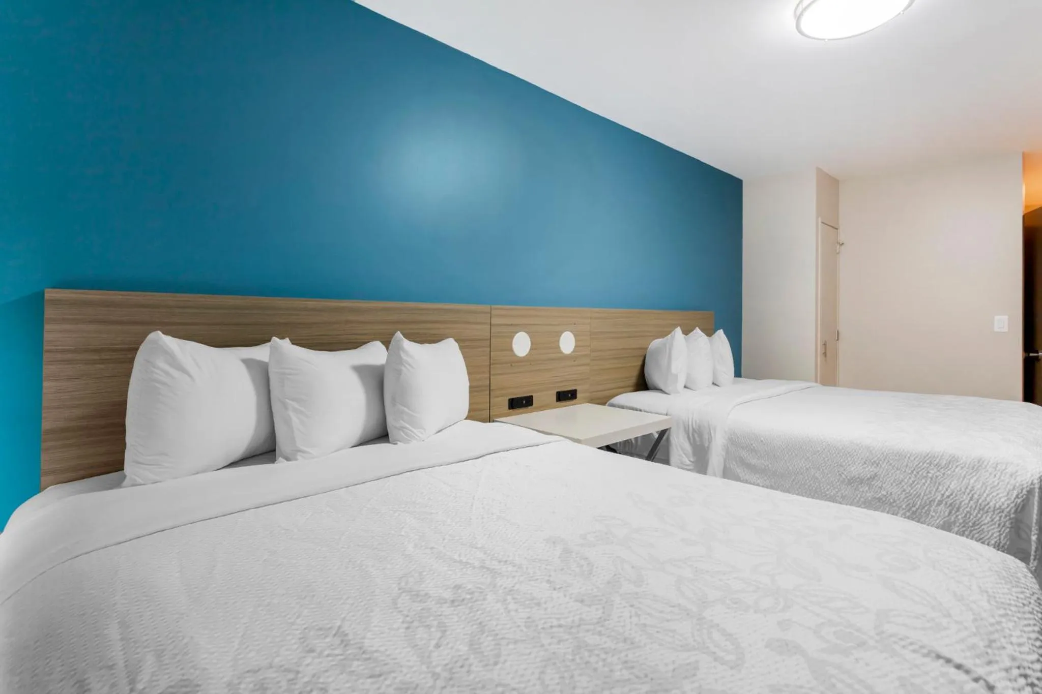 Photo of the whole room, Bed in Red Roof PLUS Brooklyn - Flatbush Ave