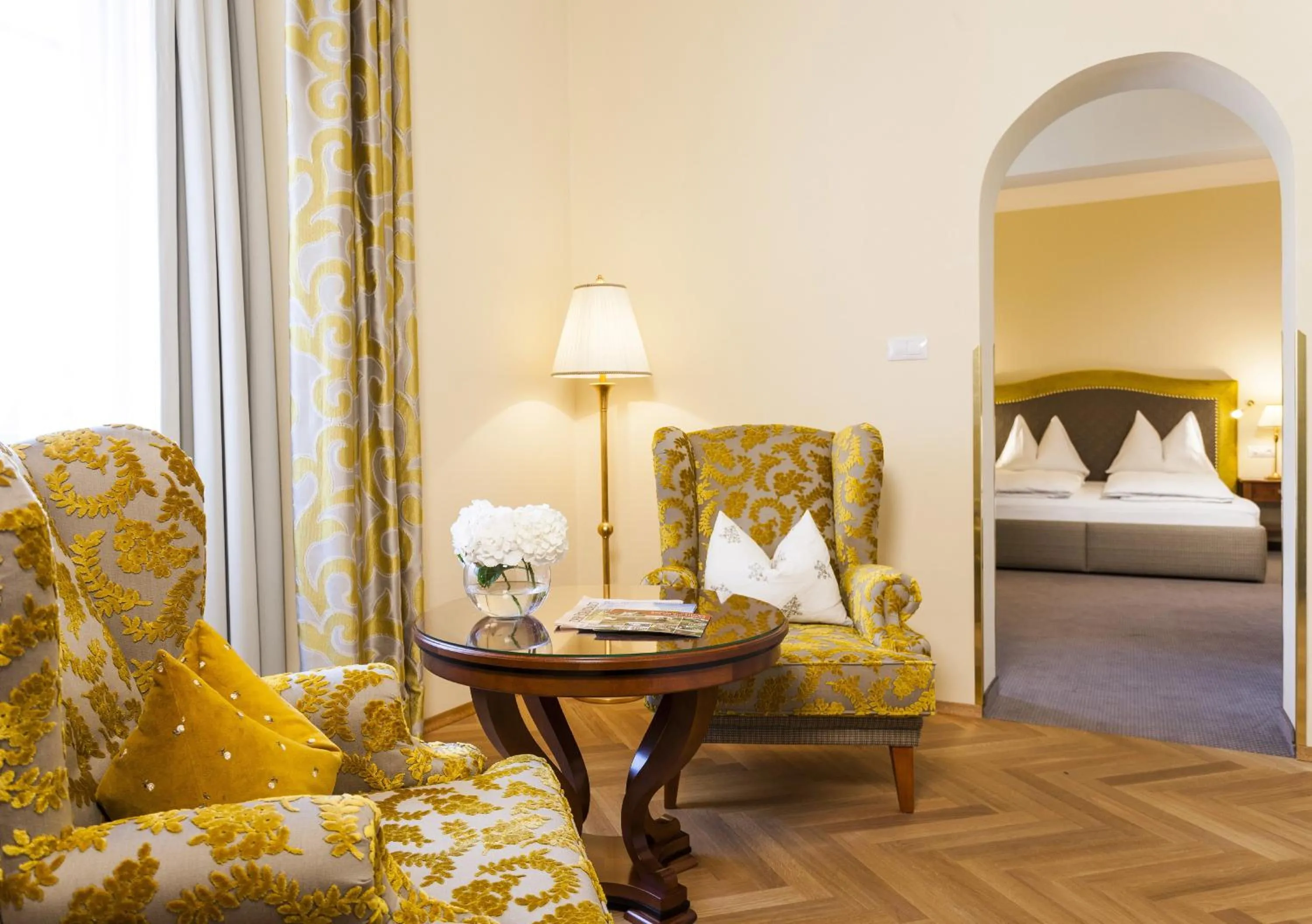 Seating area, Bed in Parkhotel Graz - Traditional Luxury