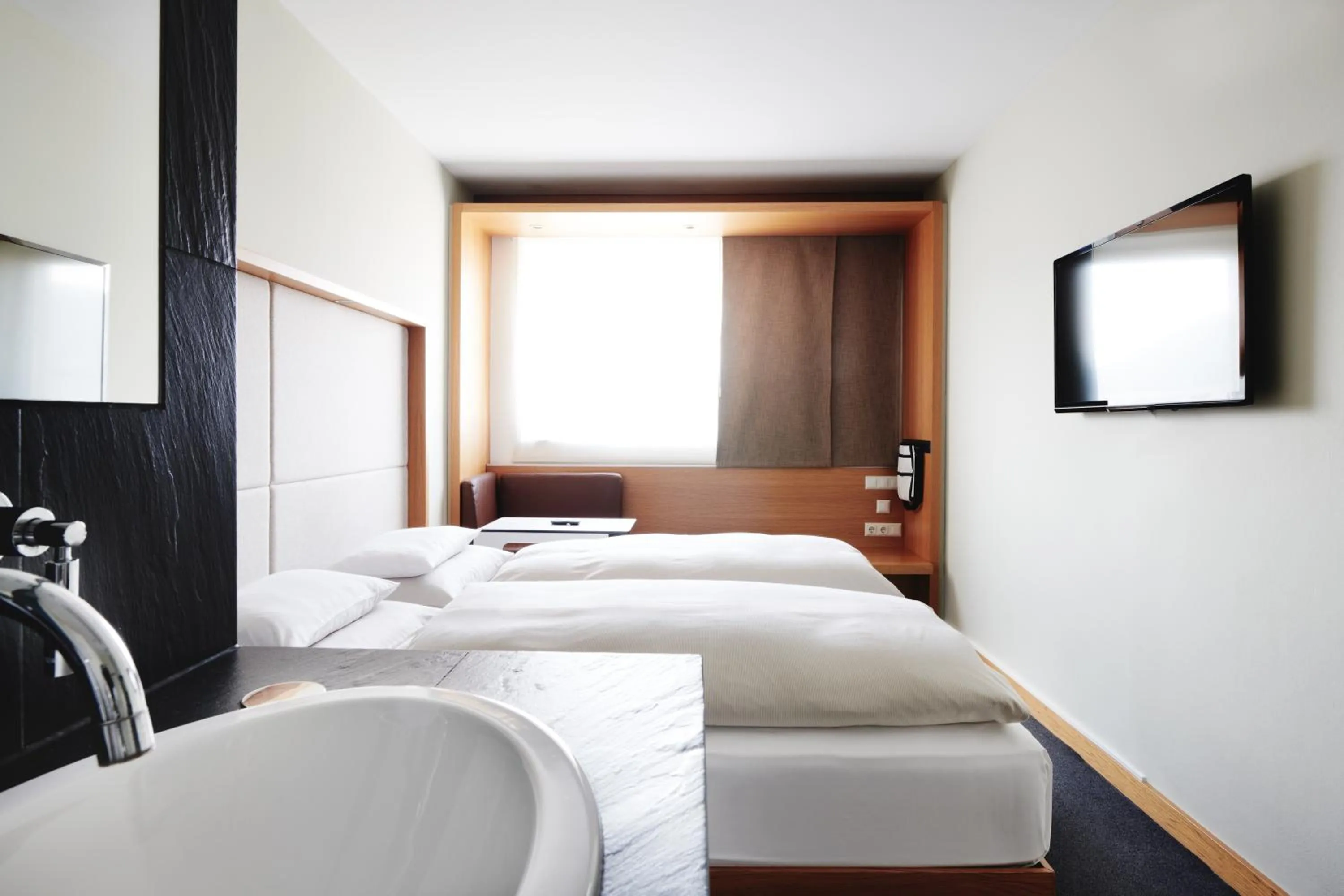 Photo of the whole room, Bed in Hotel Daniel Graz - Smart Lifestyle Near City Centre