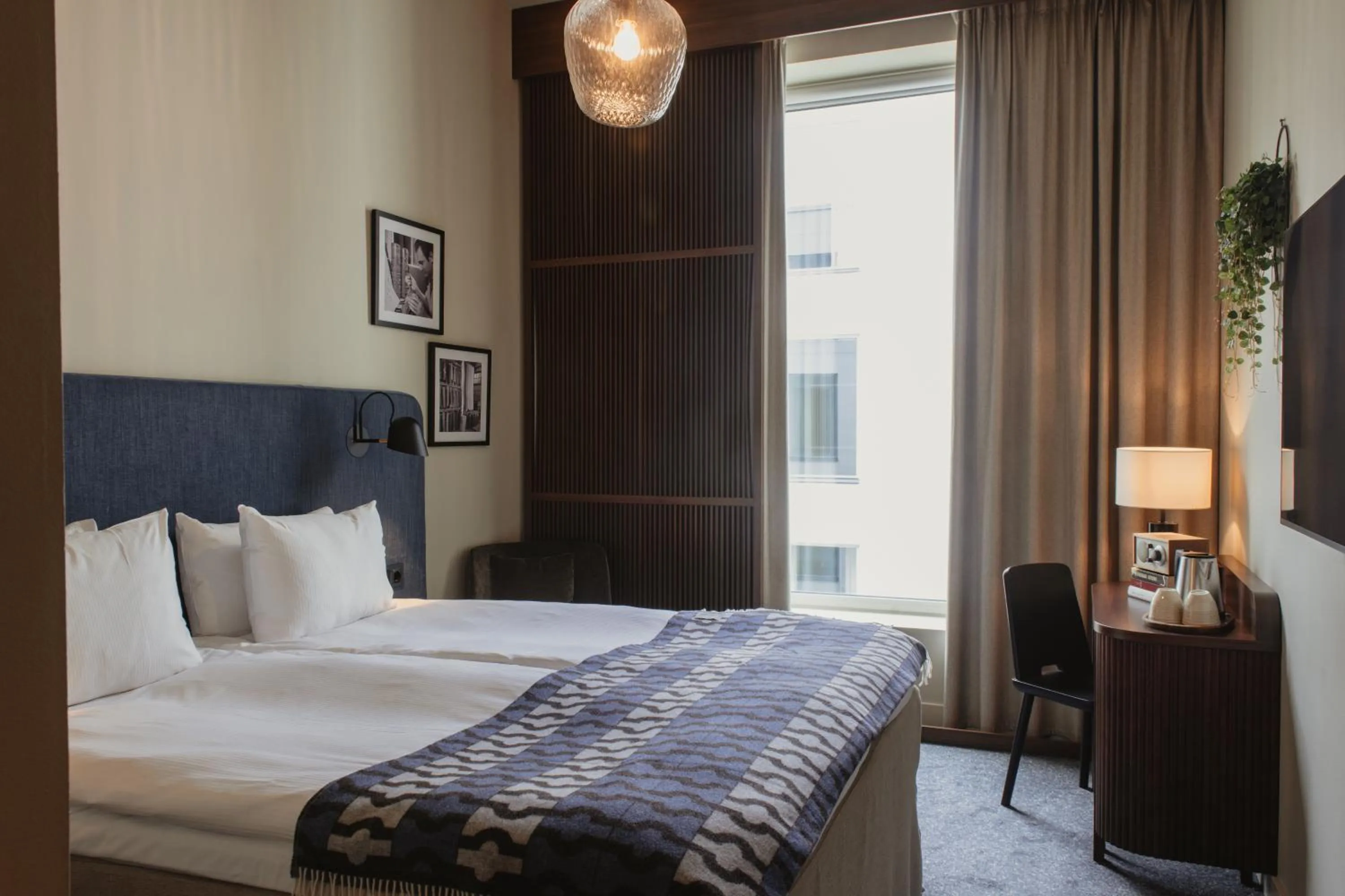 Bed in Home Hotel Tapetfabriken