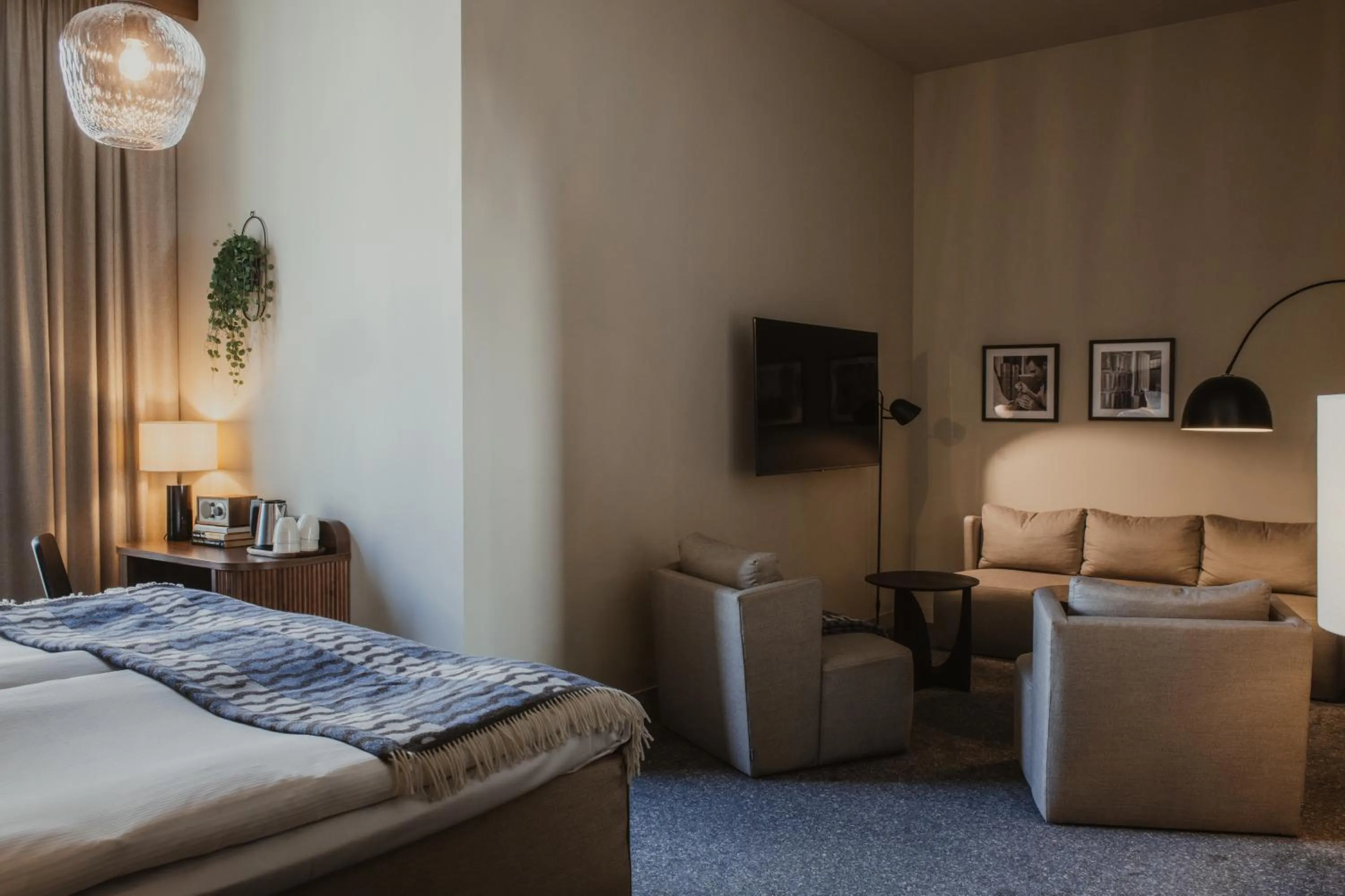 Seating area, Bed in Home Hotel Tapetfabriken