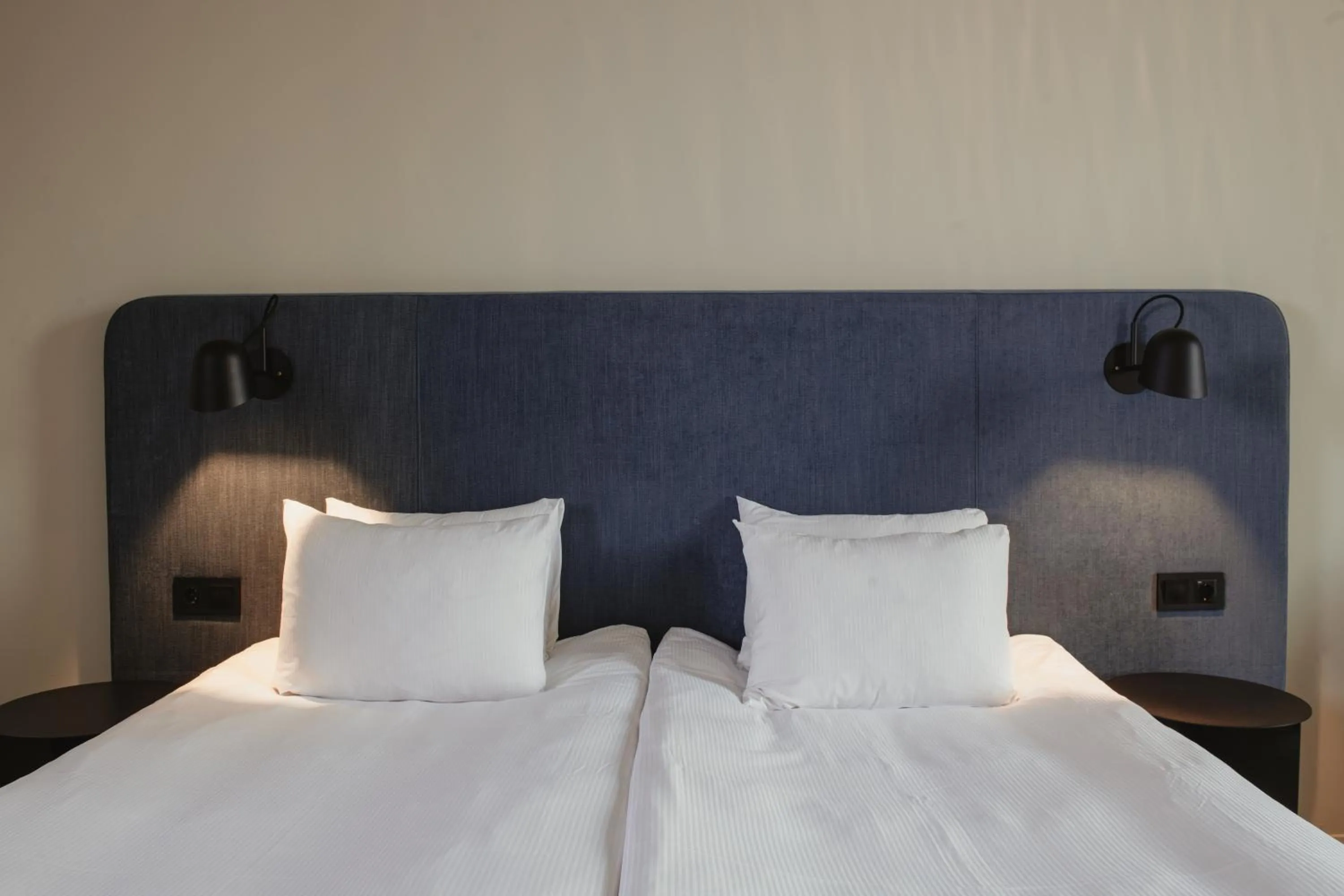 Bed in Home Hotel Tapetfabriken