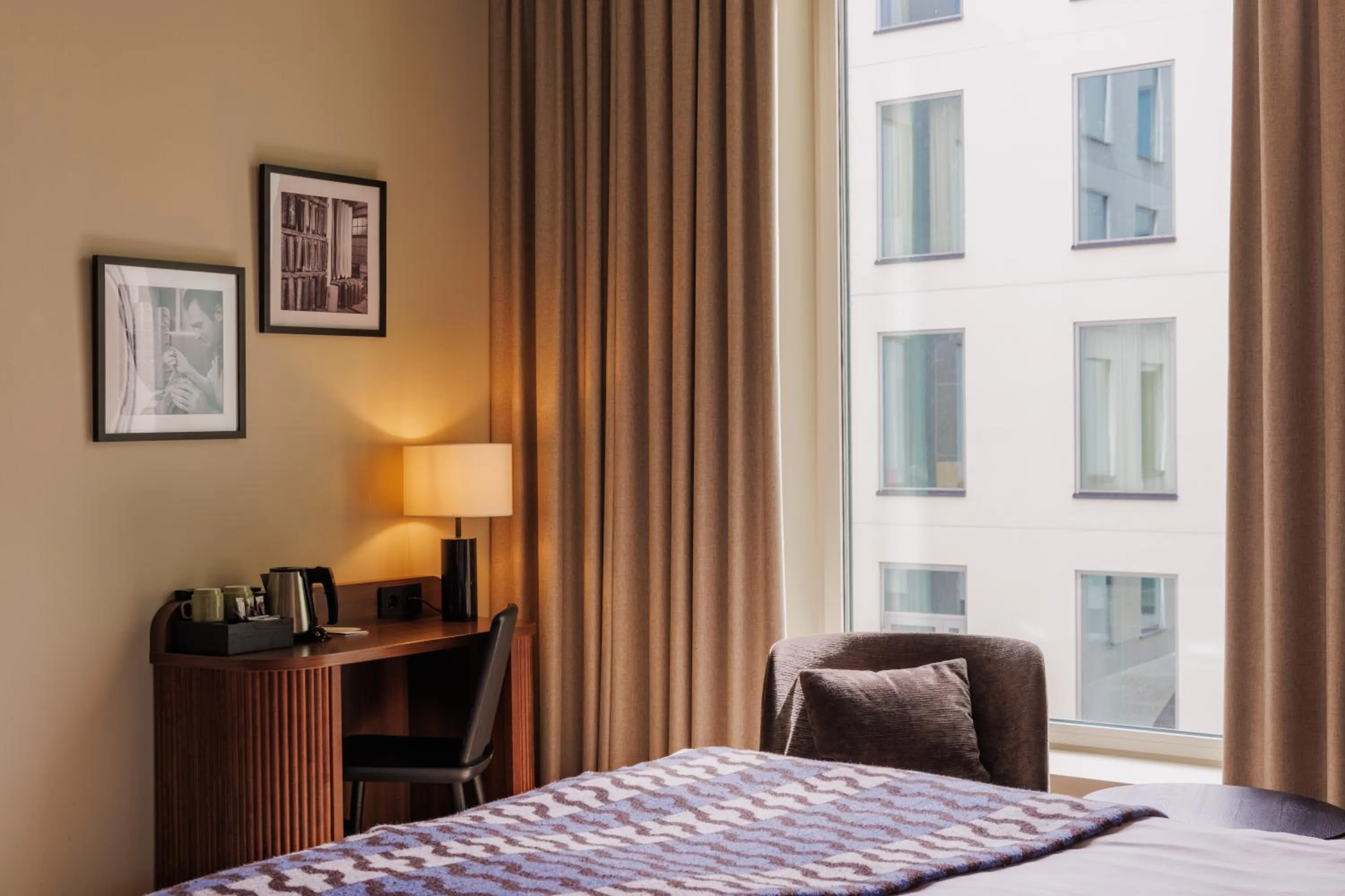 Decorative detail, Bed in Clarion Collection Hotel Tapetfabriken