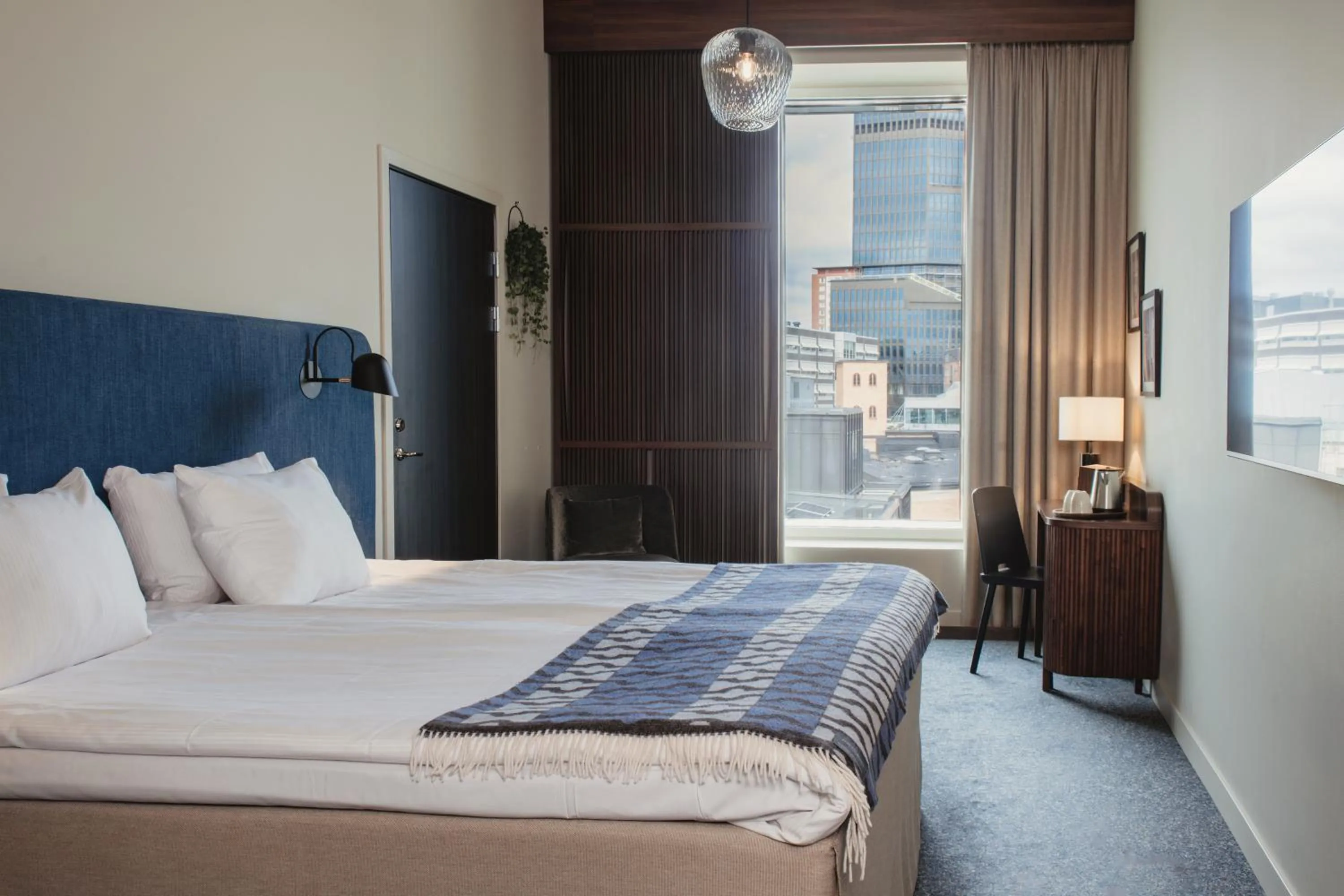 Bed in Home Hotel Tapetfabriken