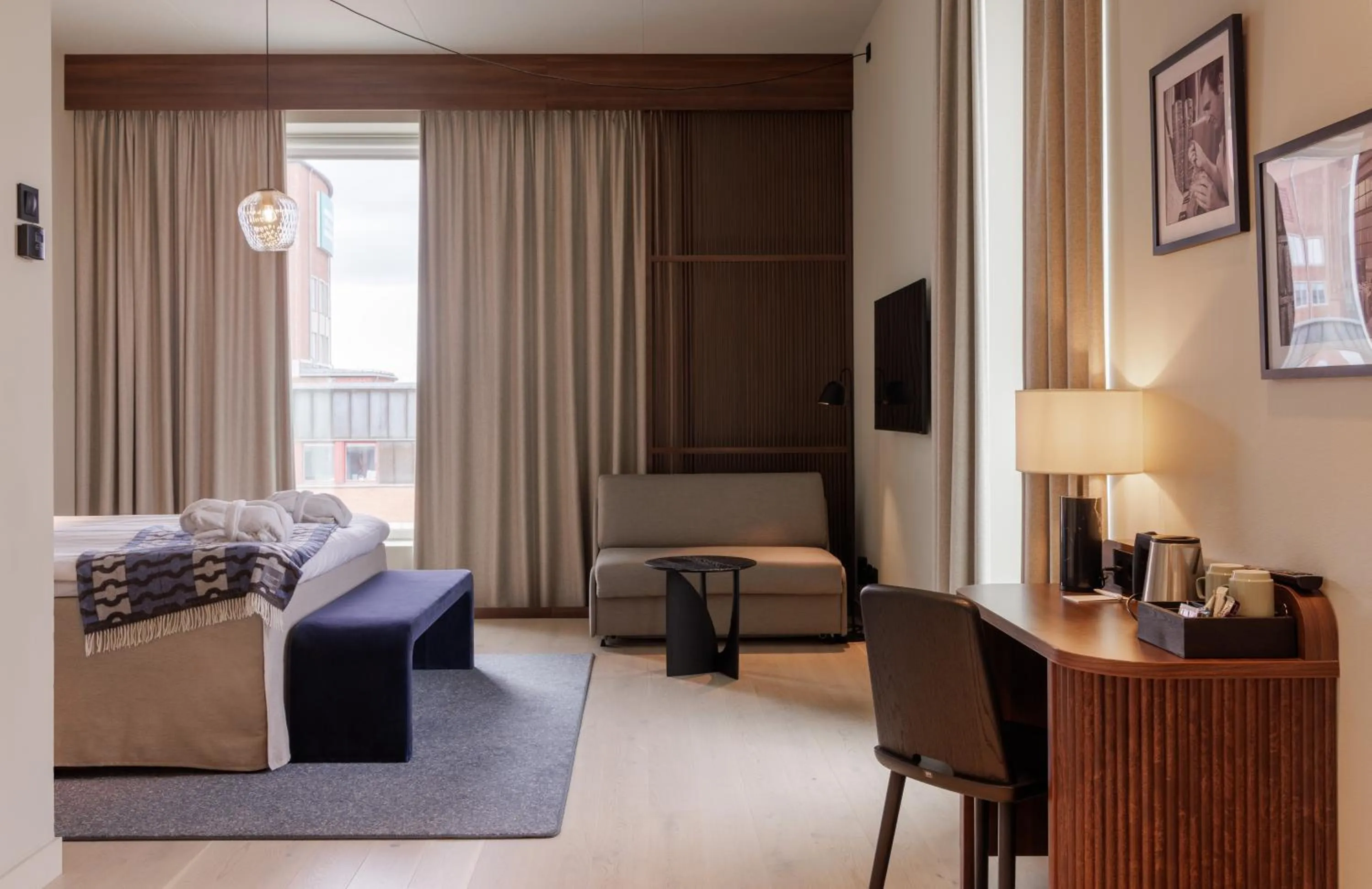 Bed in Clarion Collection Hotel Tapetfabriken