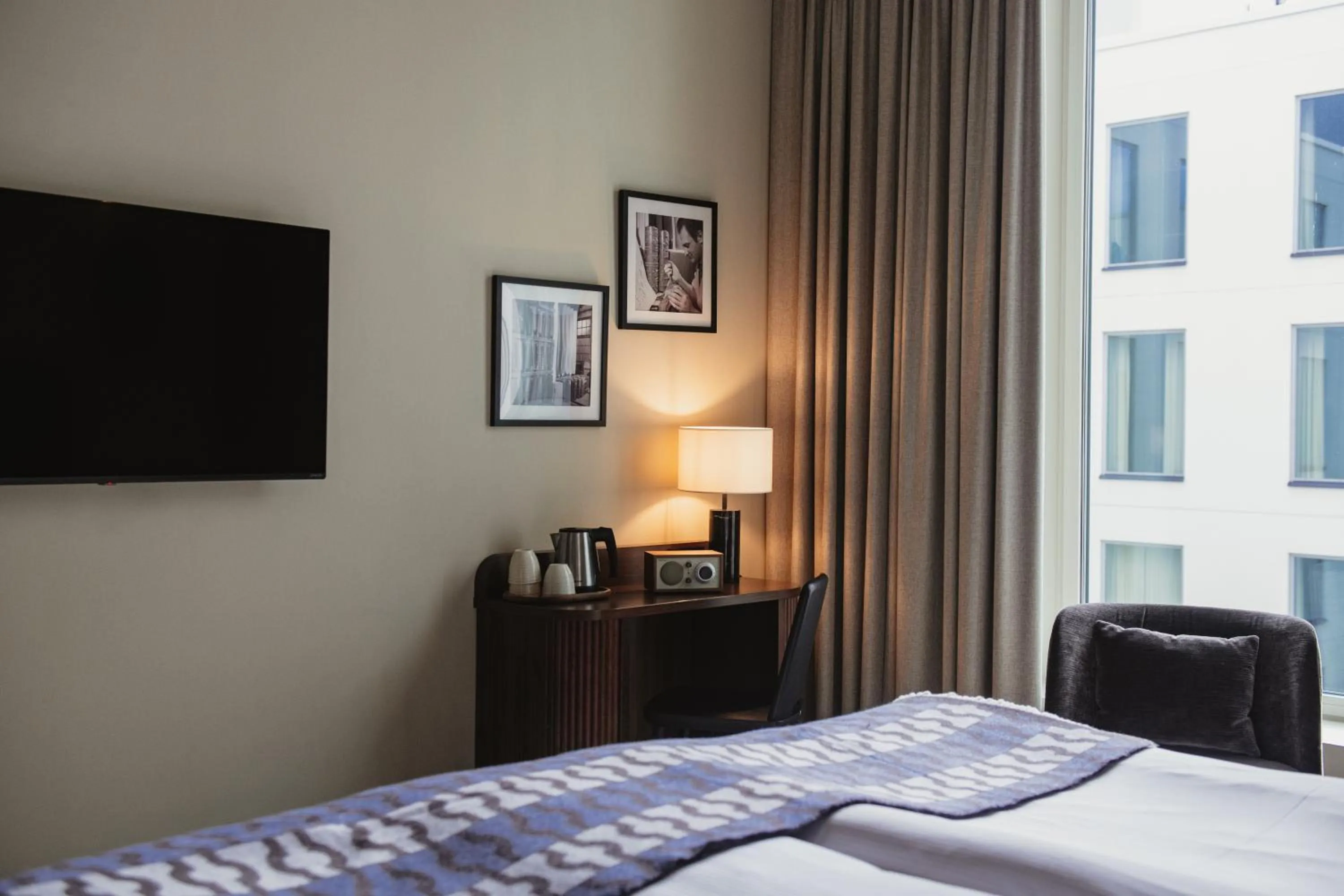 Bed in Home Hotel Tapetfabriken