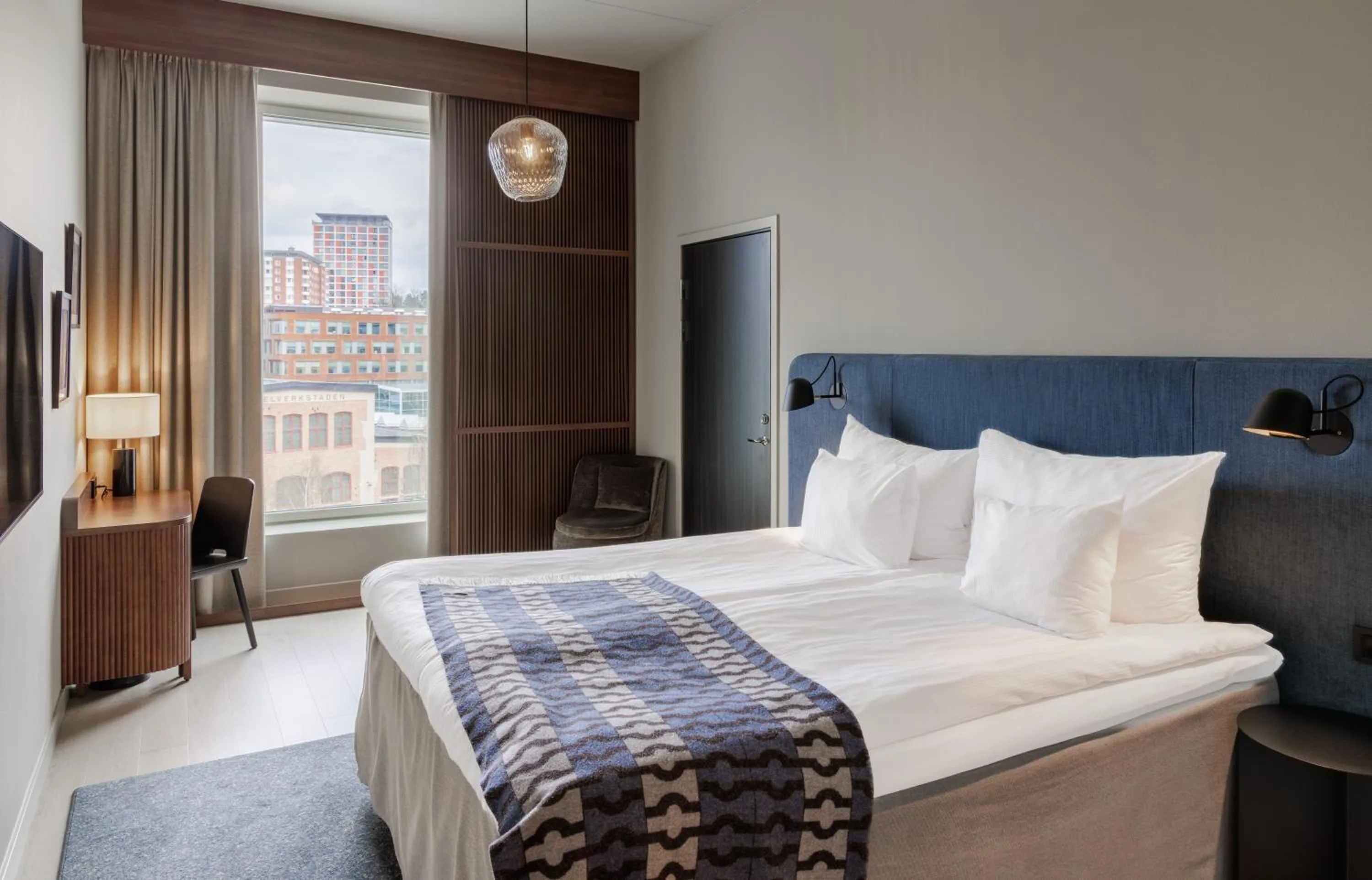 Bed in Clarion Collection Hotel Tapetfabriken