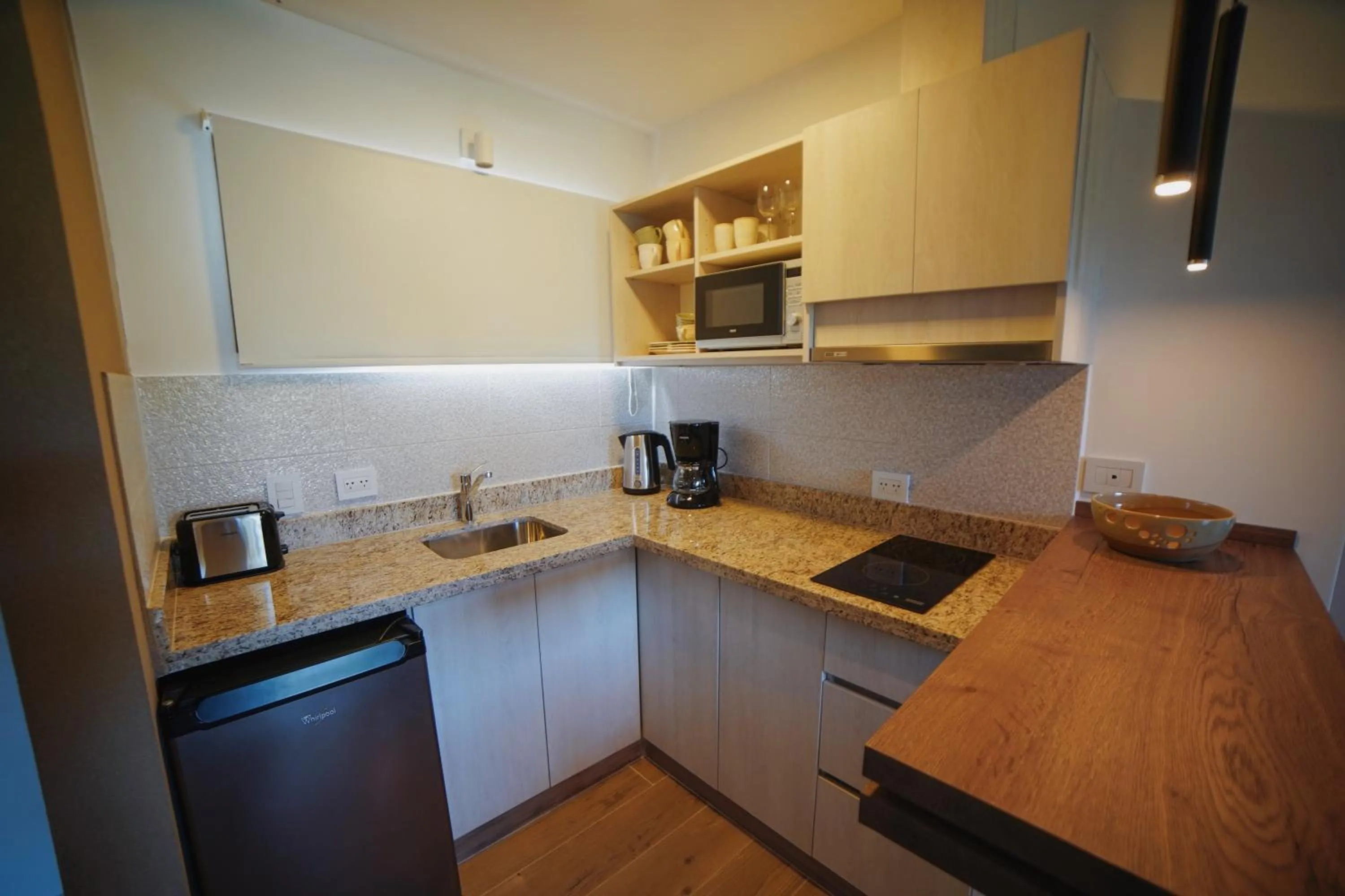 Kitchen or kitchenette in AWKA Apart Hotel