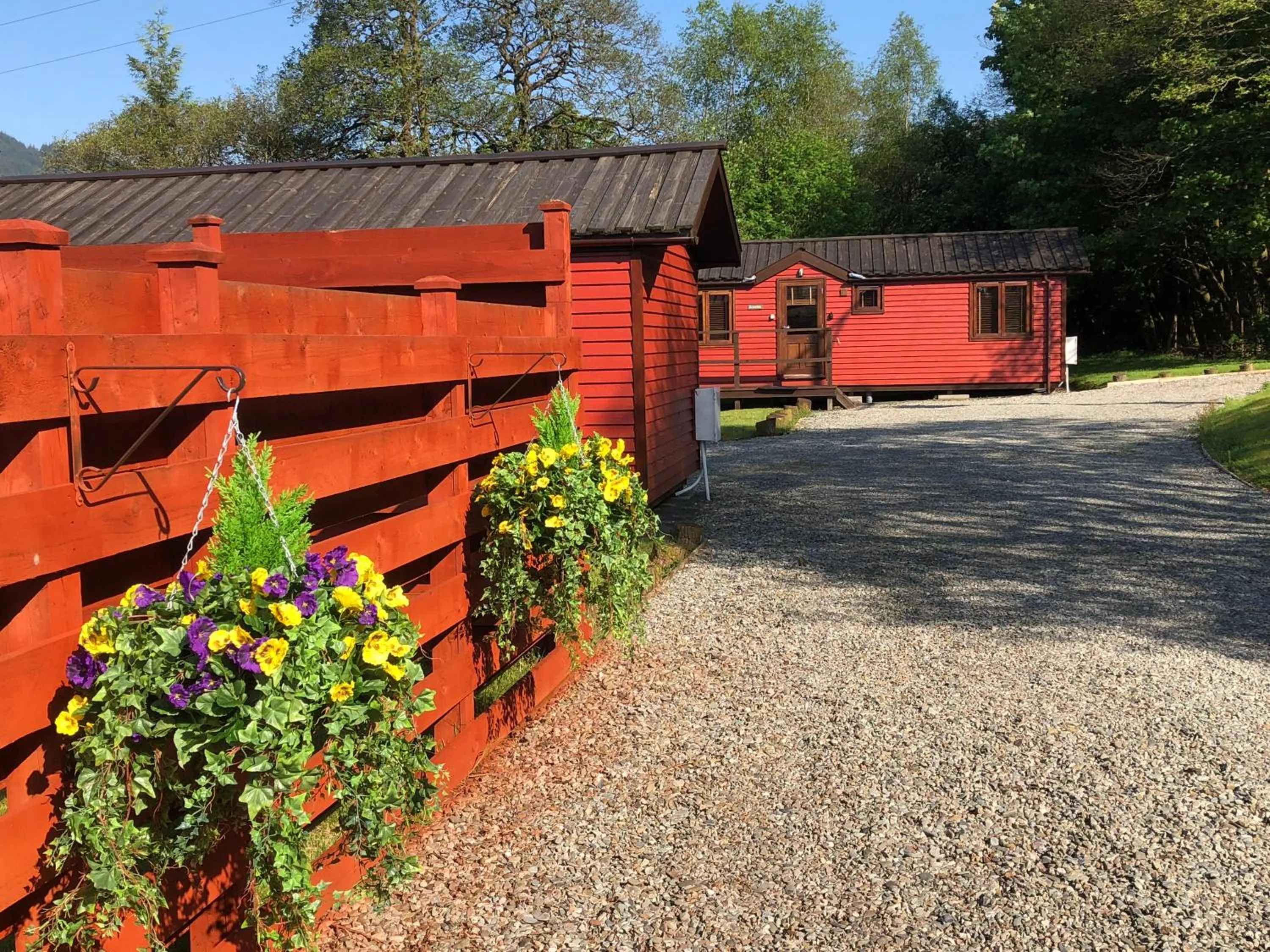 Property building in Rashfield Sheilings - Riverside Lodges, by Pucks Glen, Dunoon