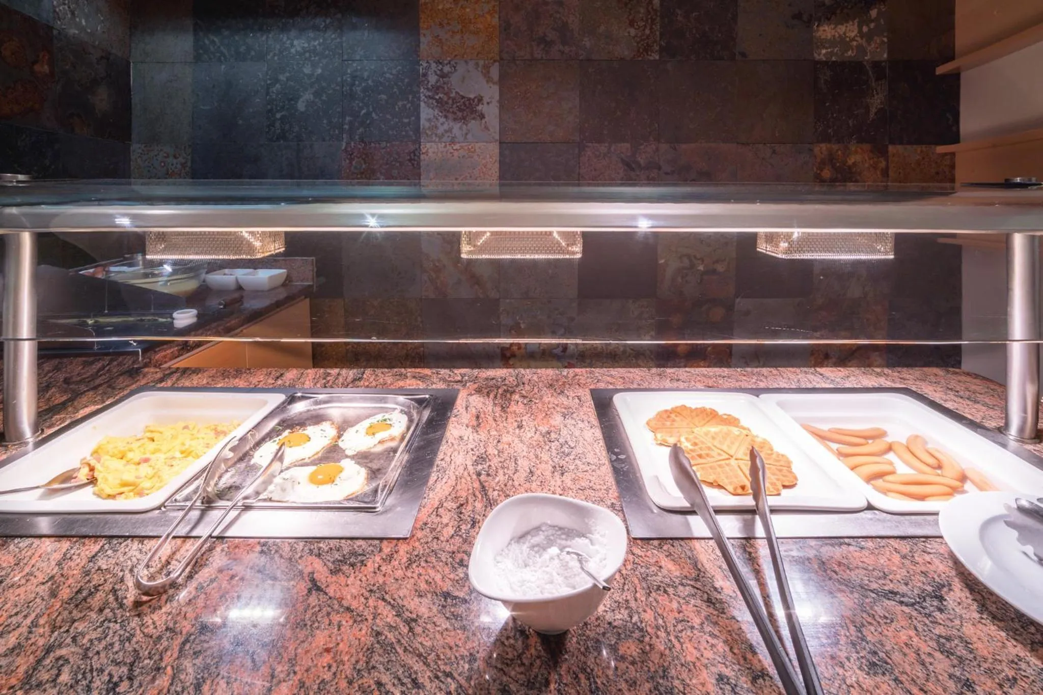 Buffet breakfast in Alpen Adria Hotel & Spa